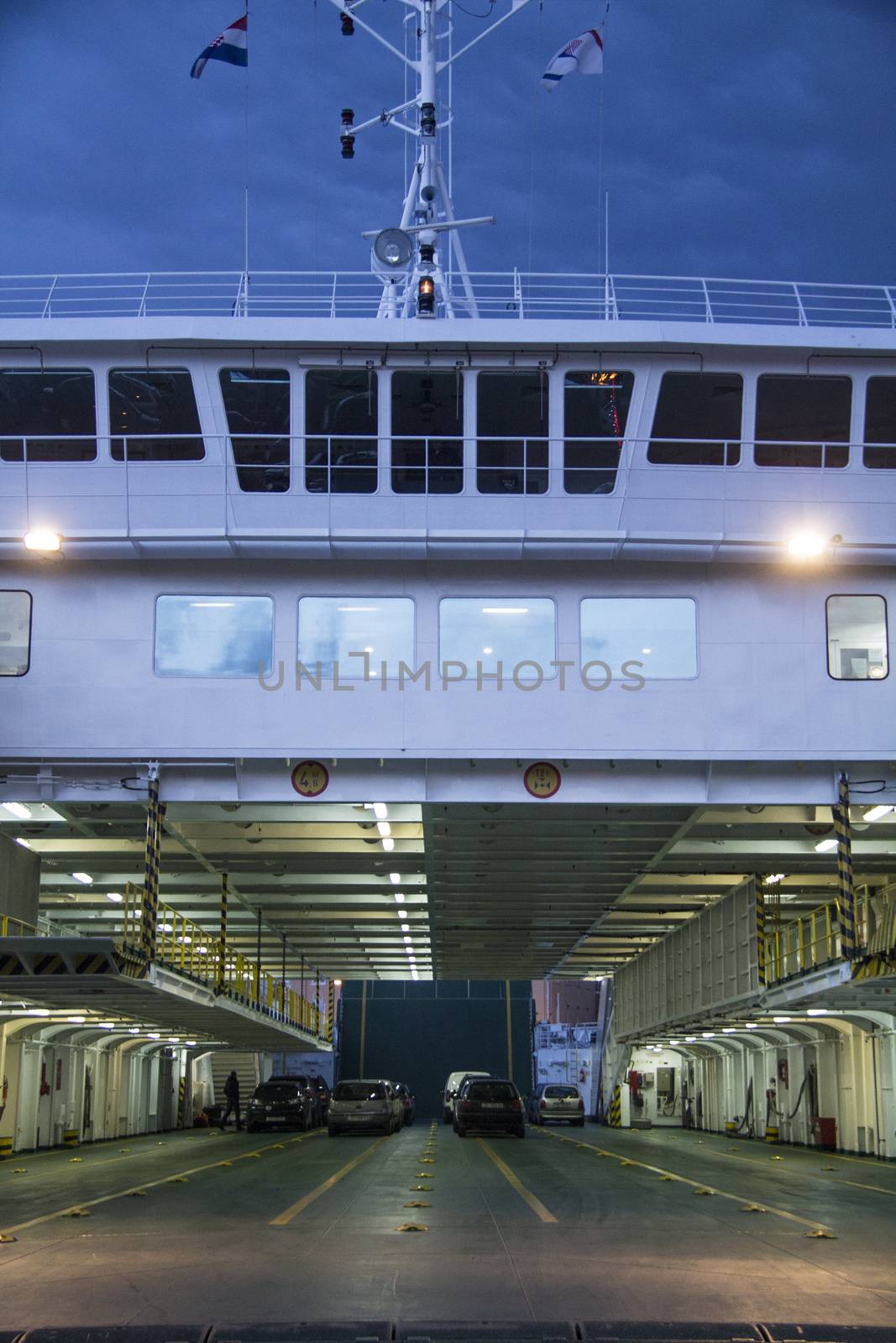 Detailed view on car ferry's nautical bridge and car deck.