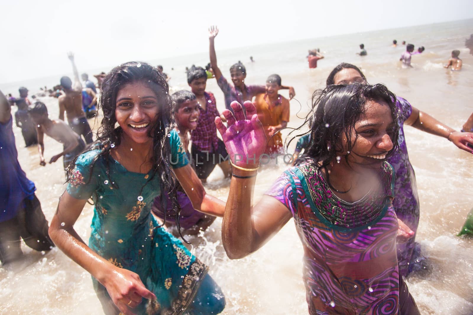 Young girls at Holi celebration in India by Aarstudio