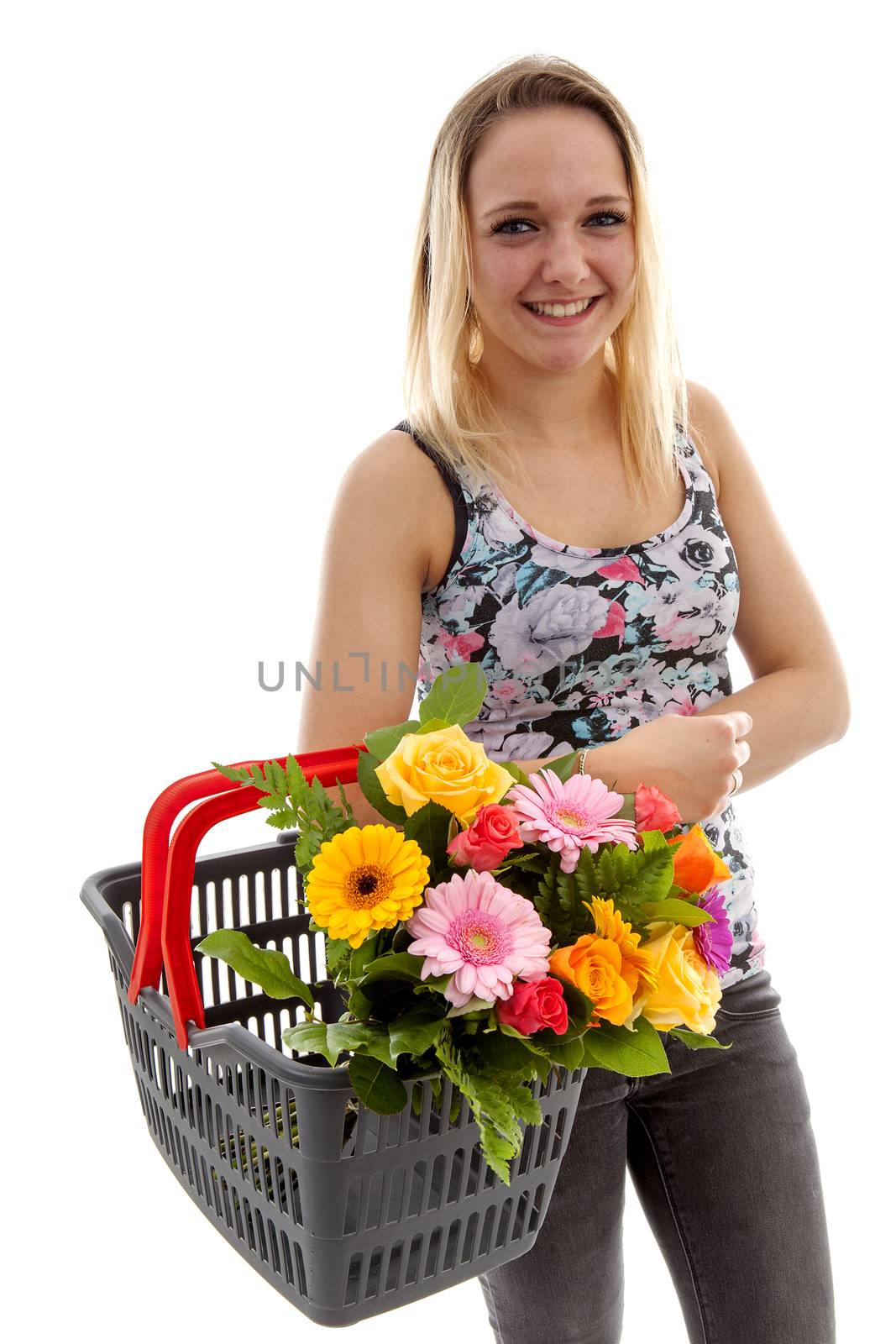 Young woman is holding basket with bouquet of colorful flowers by sannie32