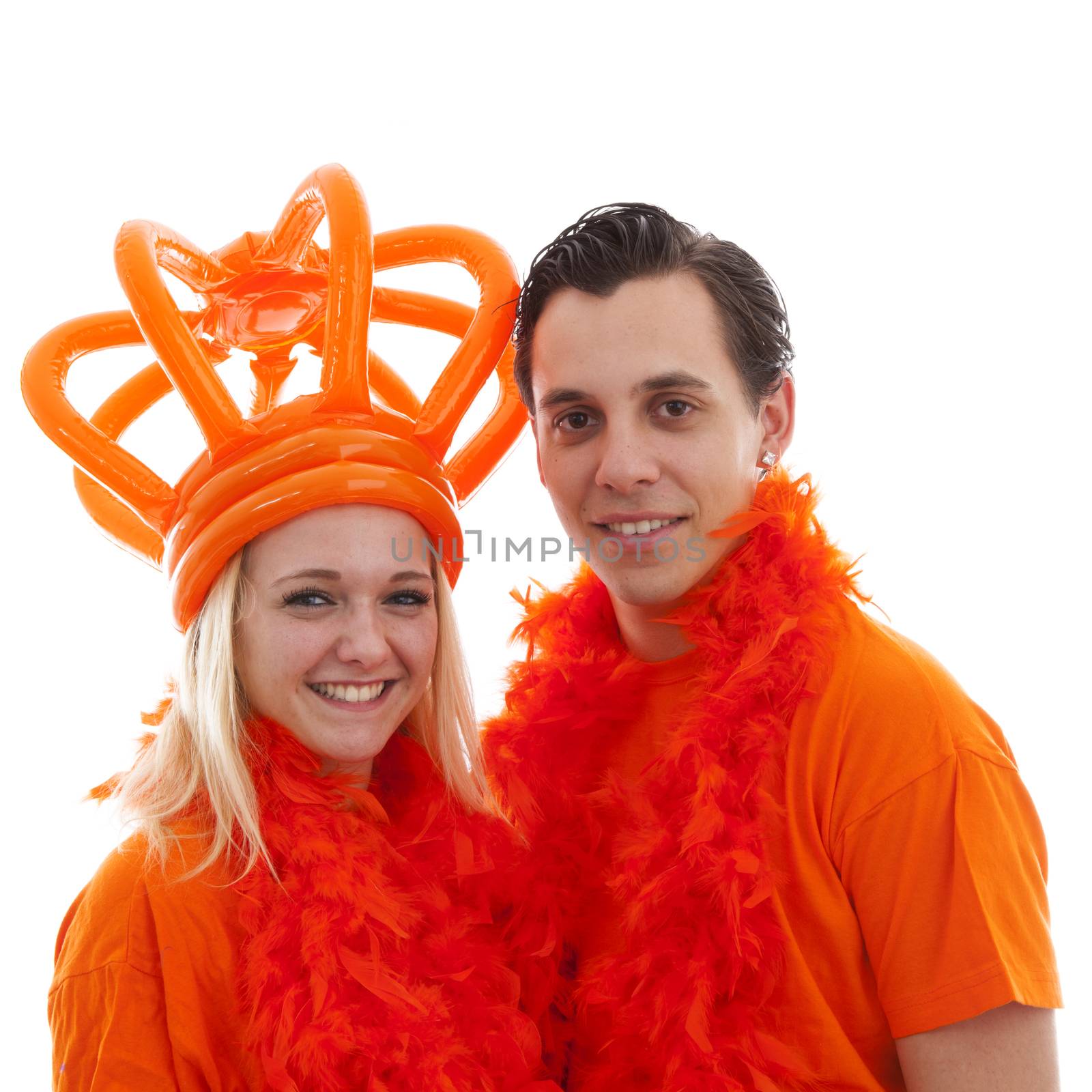 Couple of Dutch soccer supporters over white background