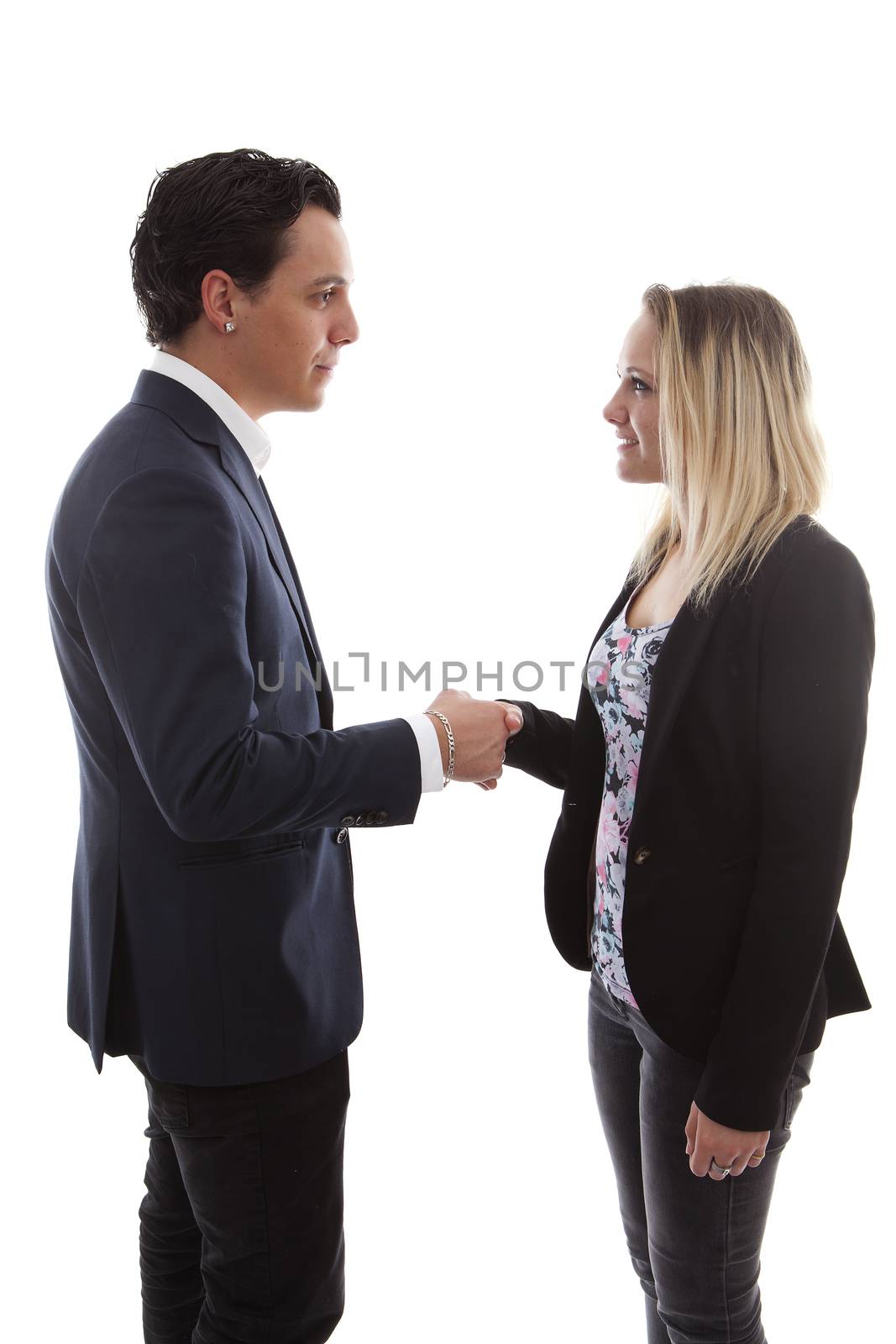 Businessman is shaking young woman hand by sannie32