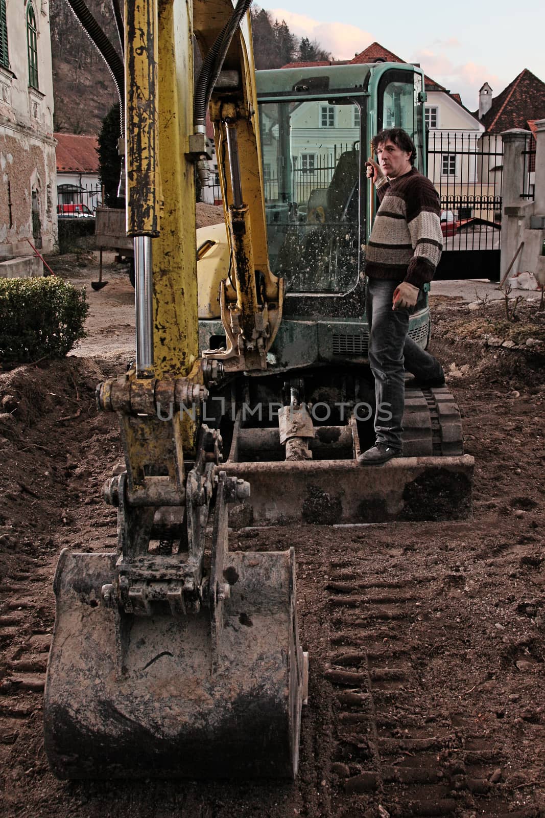 Man working in his courtyard