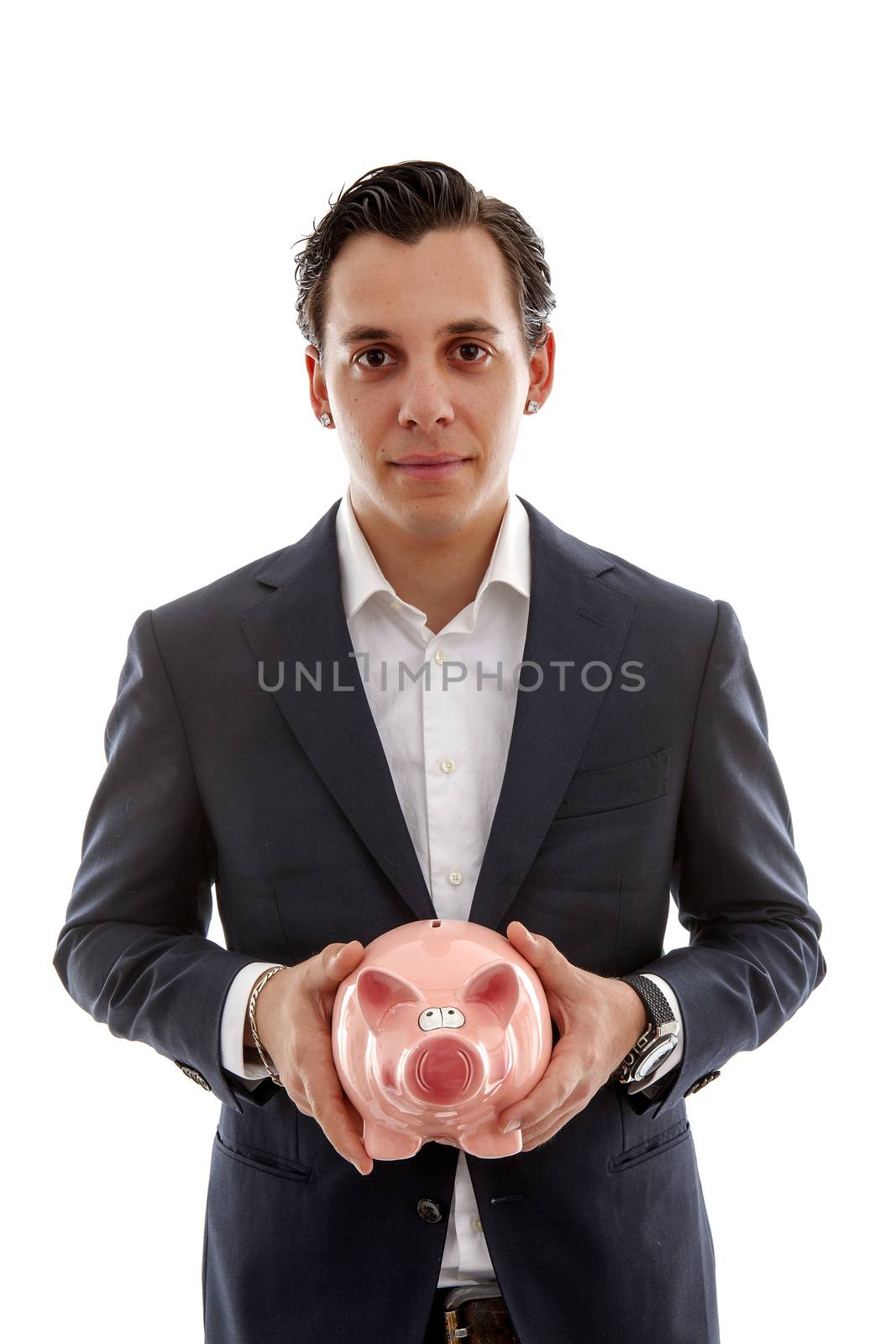 Businessman is holding piggy bank over white background