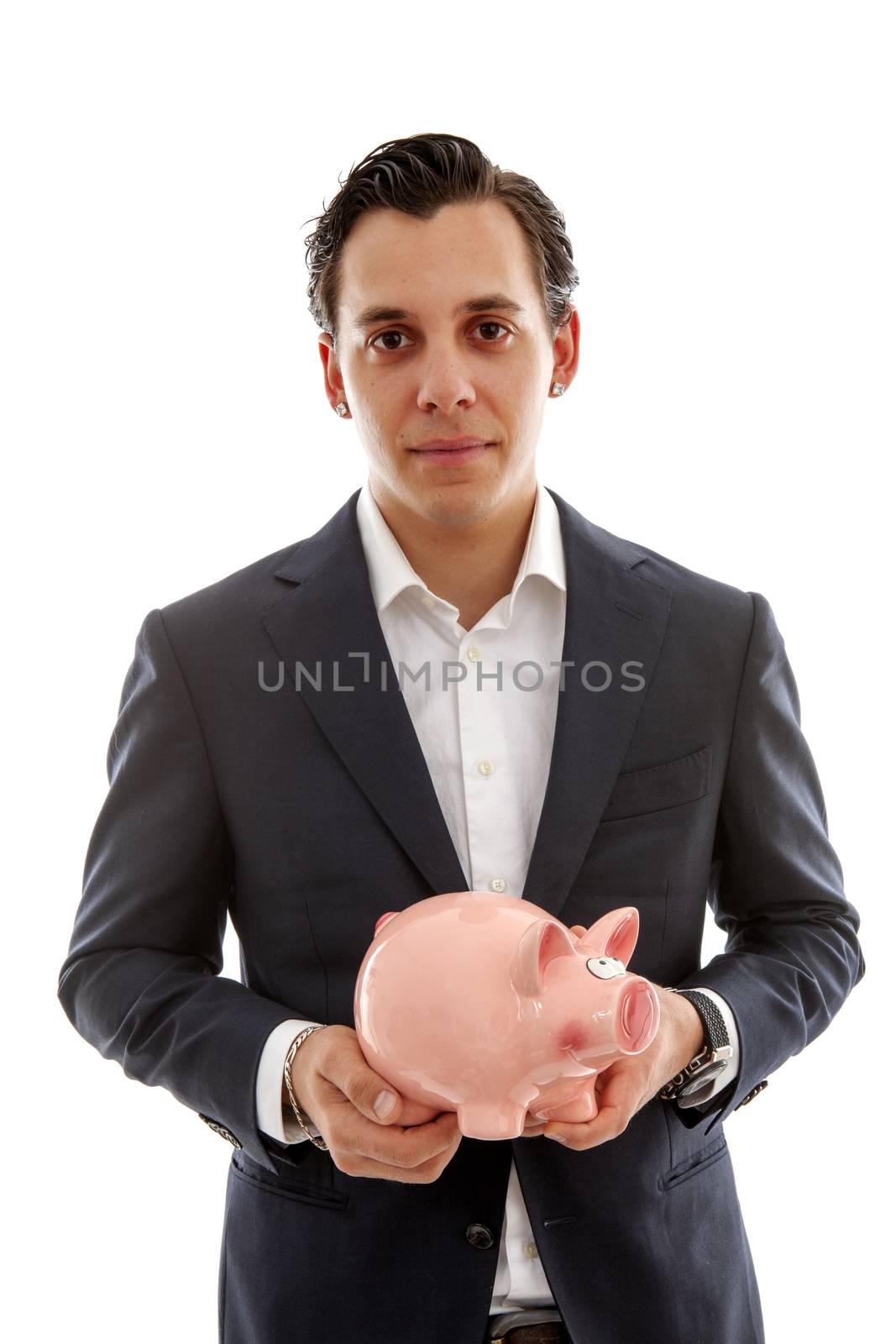 Businessman is holding piggy bank over white background