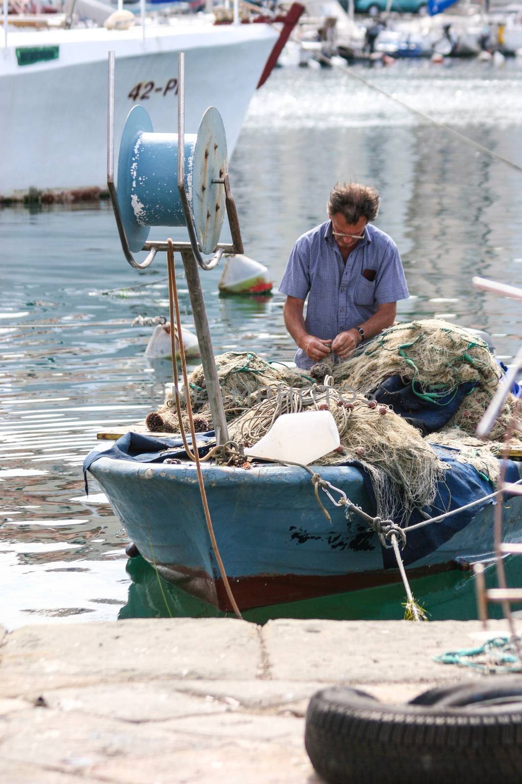 Fishermen in coastal town of Piran in Slovenia