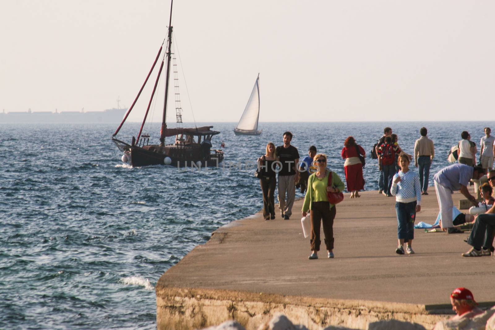 Crowded promenade in Trieste.