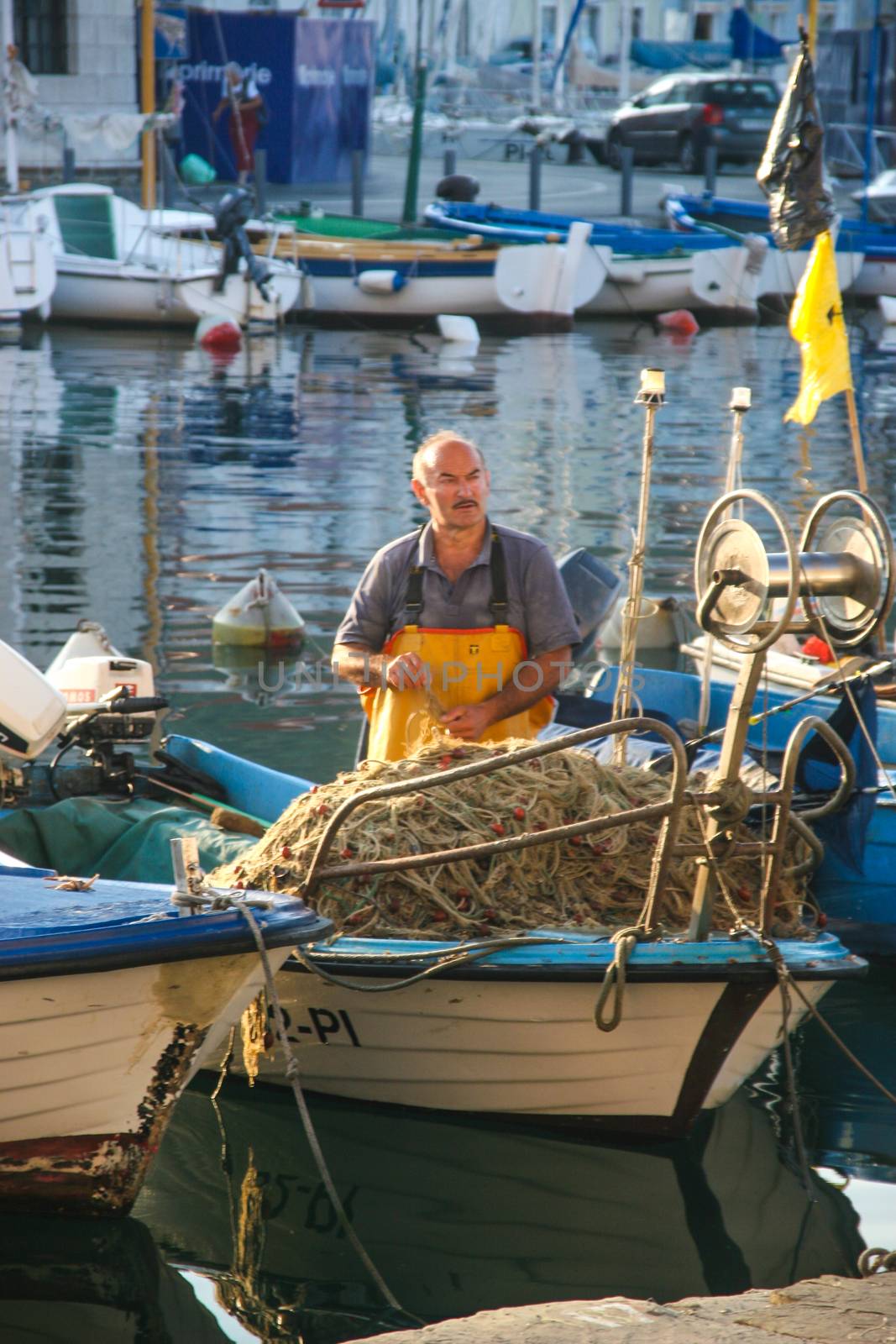 Fishermen in coastal town of Piran in Slovenia