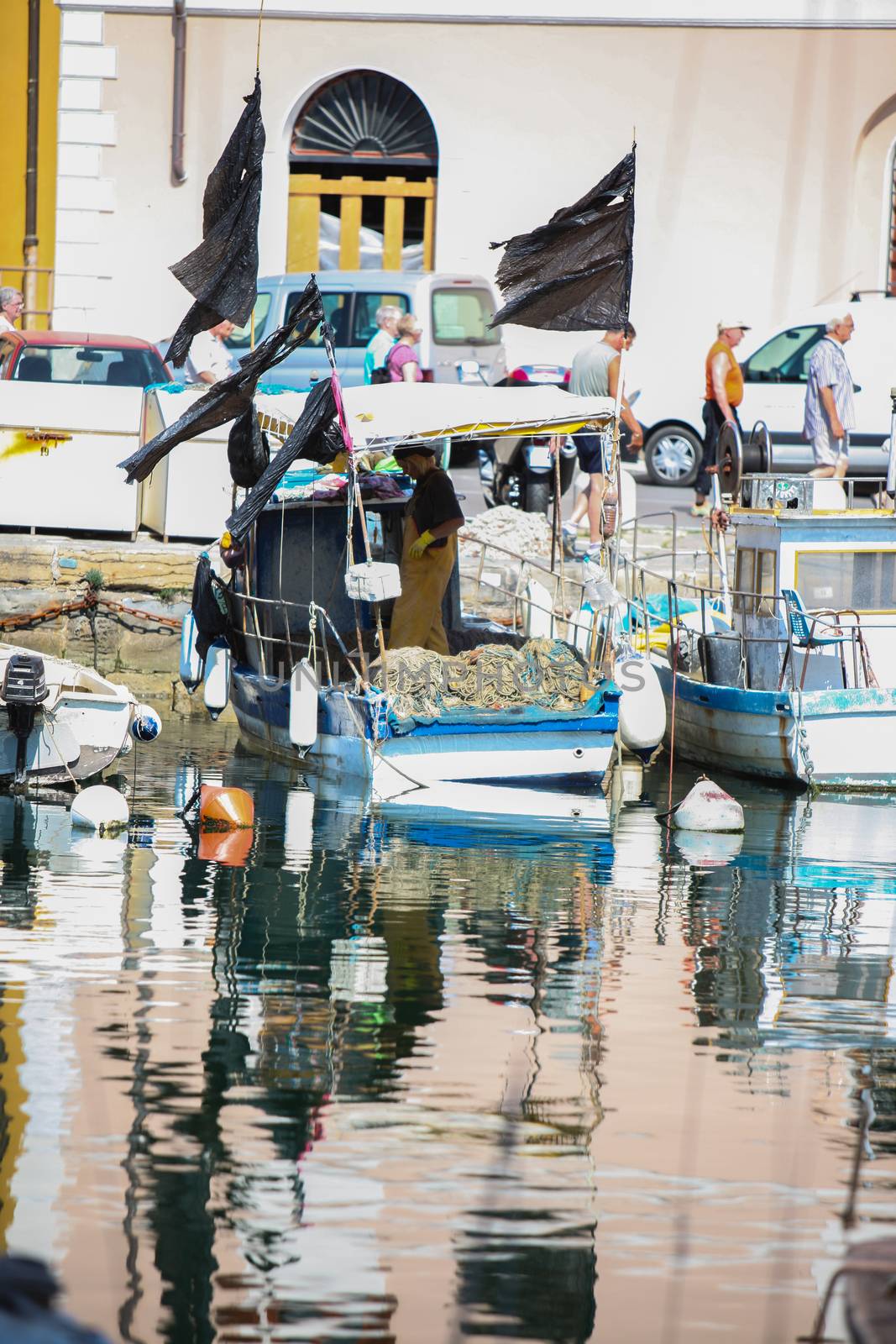 Fishermen in coastal town of Piran in Slovenia