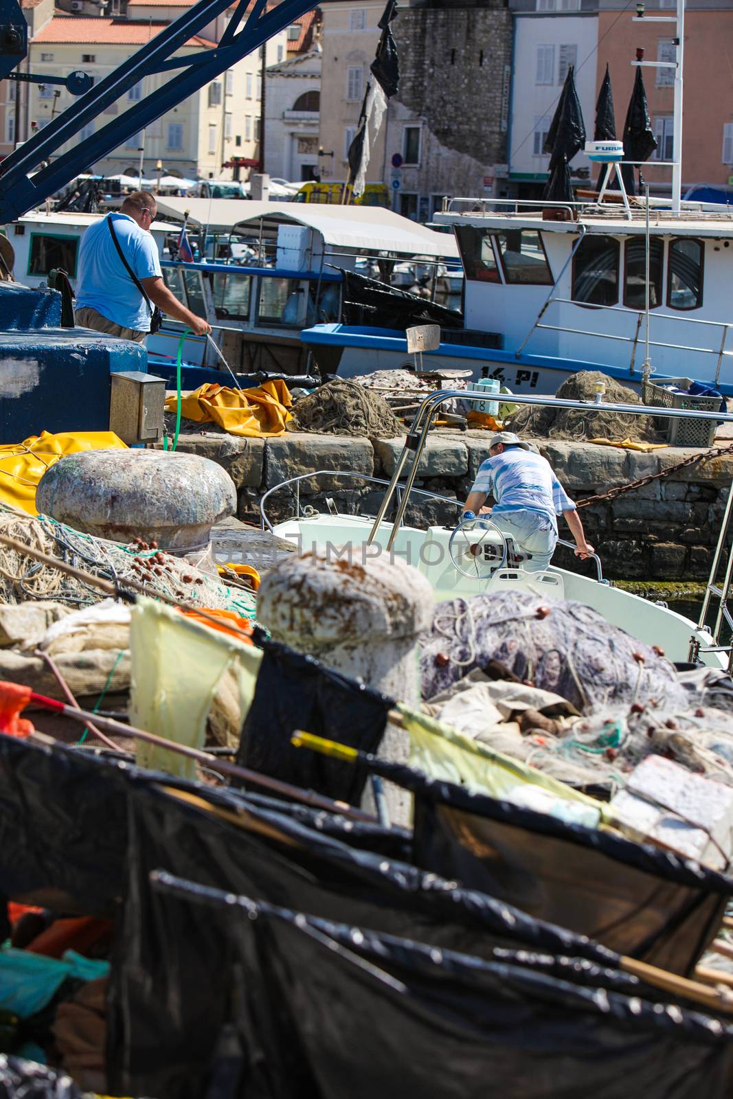 Fishermen in coastal town of Piran in Slovenia