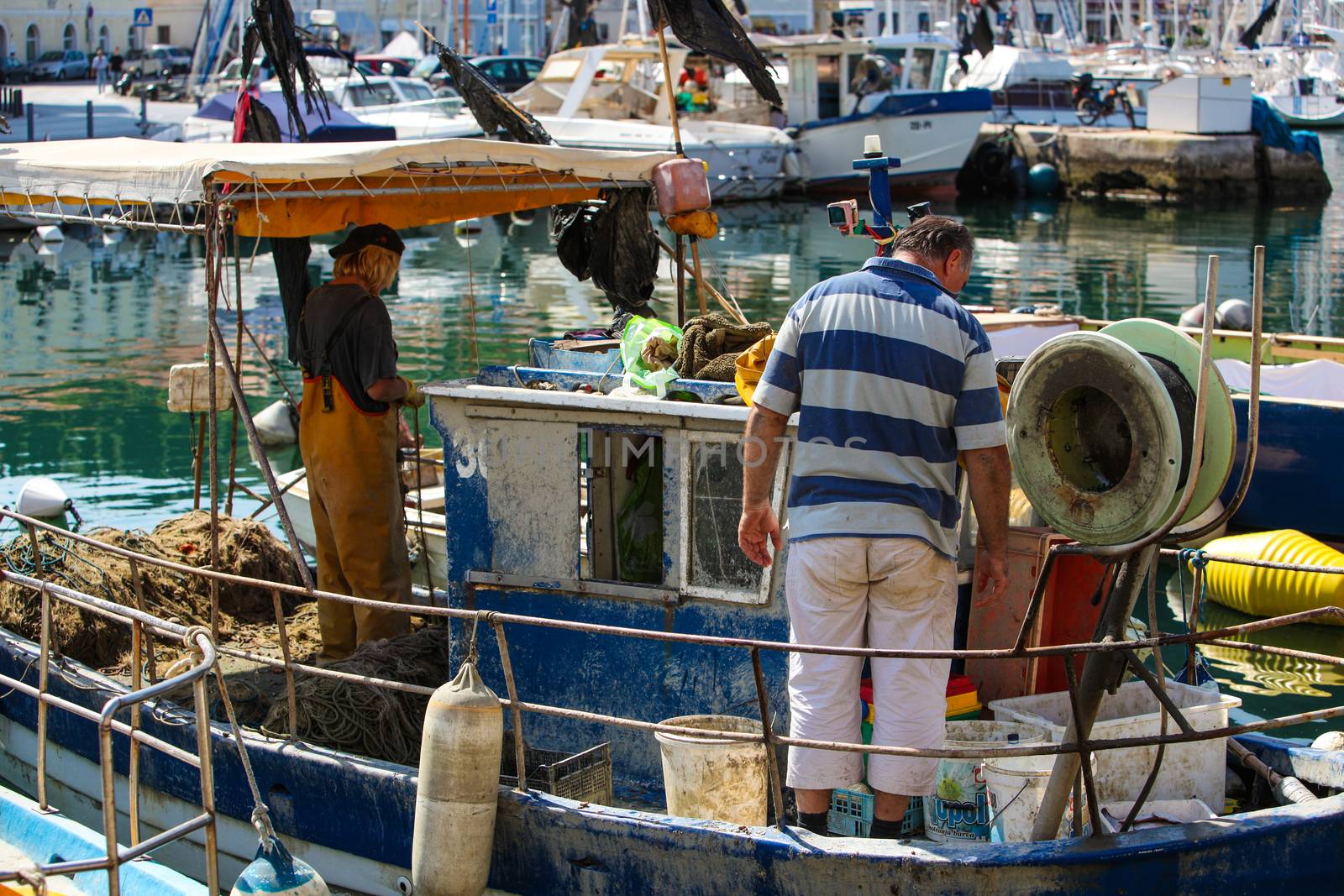 Fishermen in coastal town of Piran in Slovenia