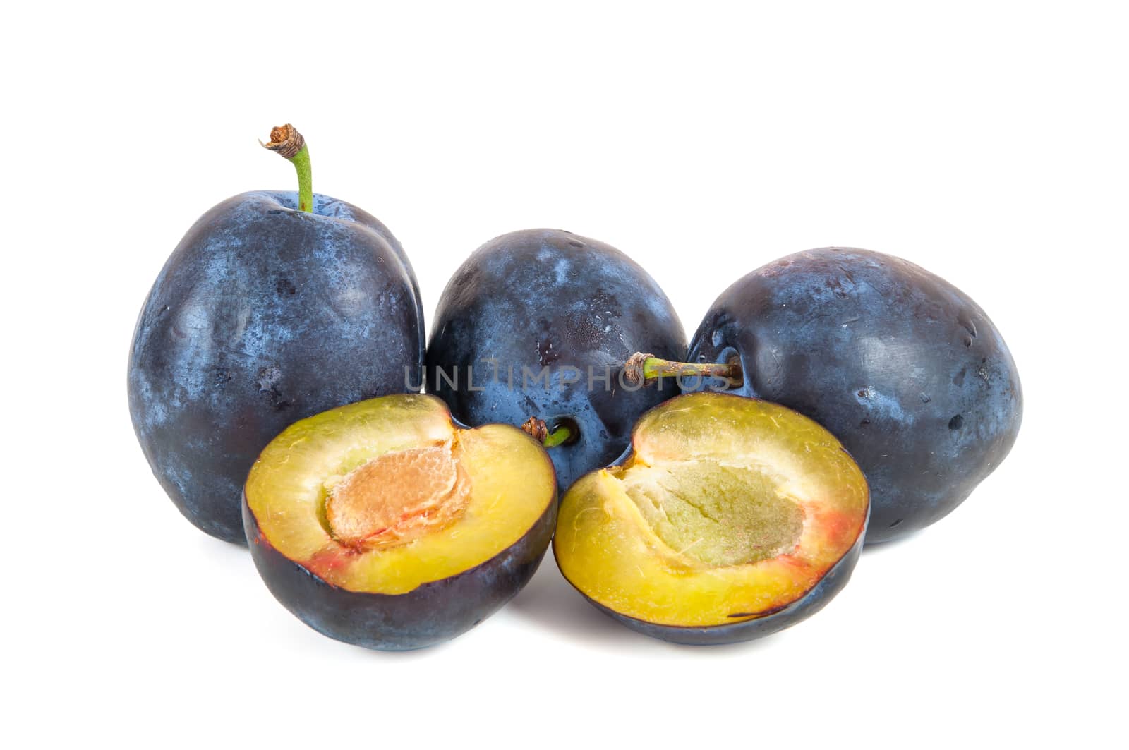 Fresh plums isolated on white background with clipping path