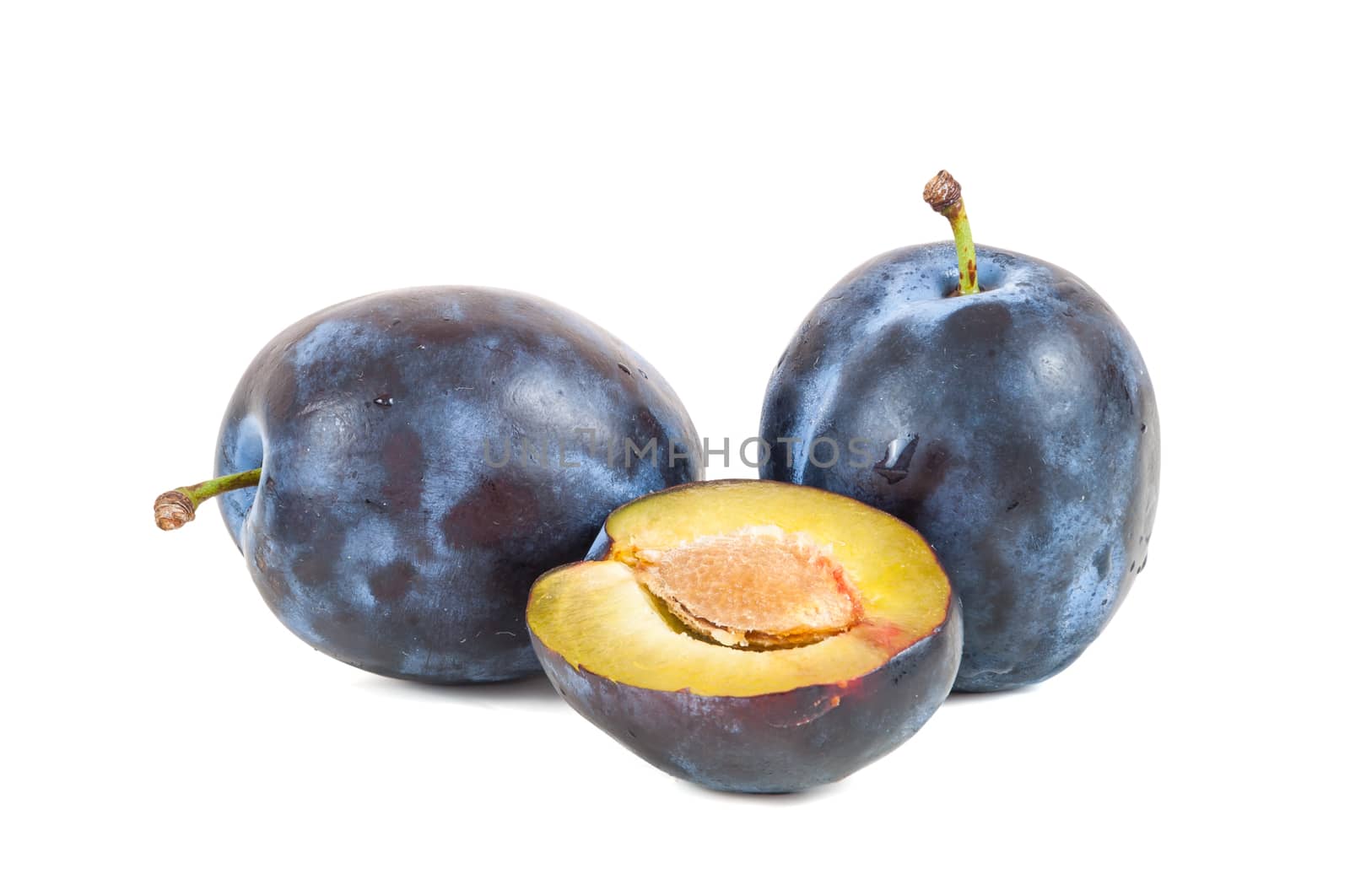 Fresh plums isolated on white background with clipping path