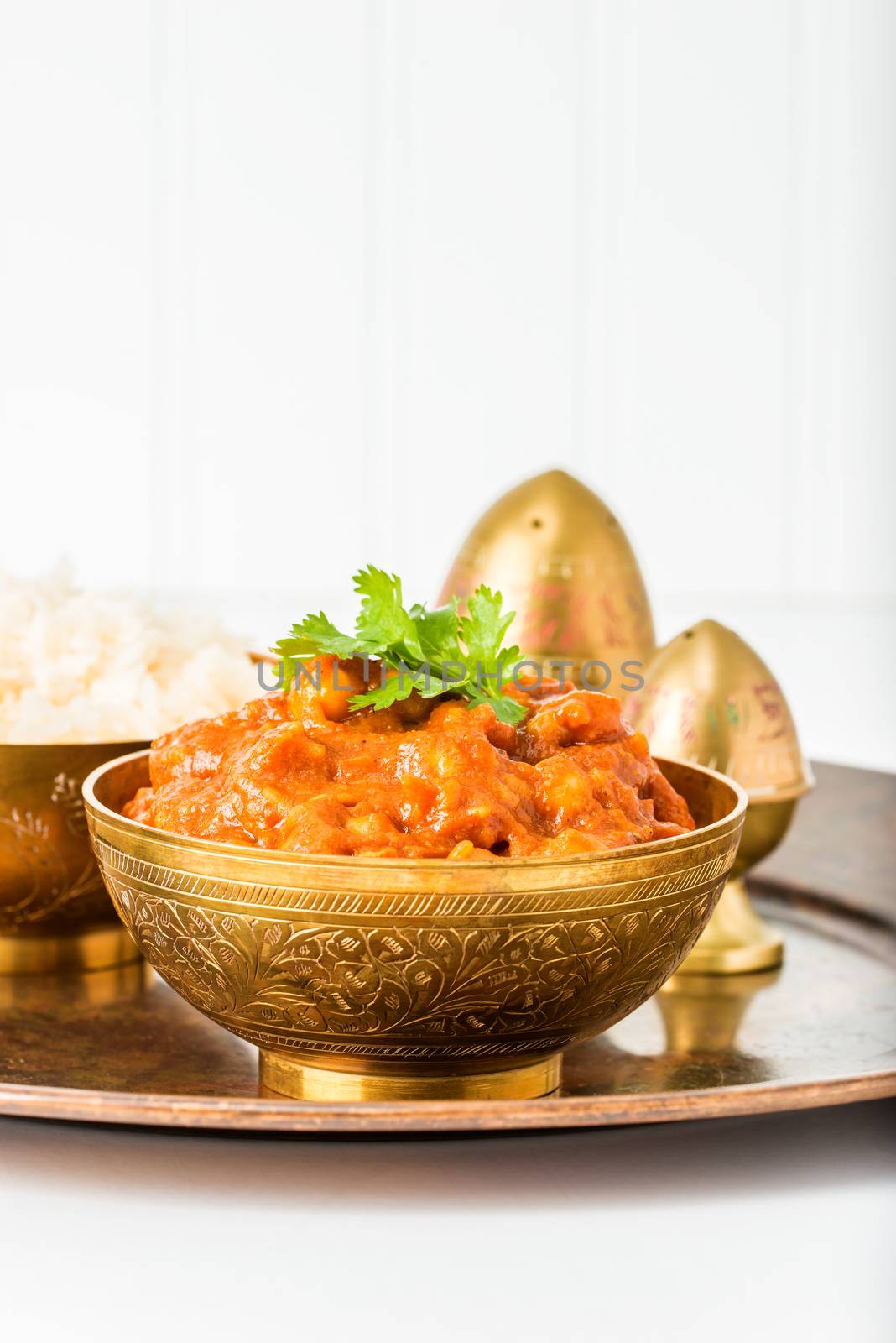 An East Indian dish consisting of chick peas in a spicy tomato sauce.