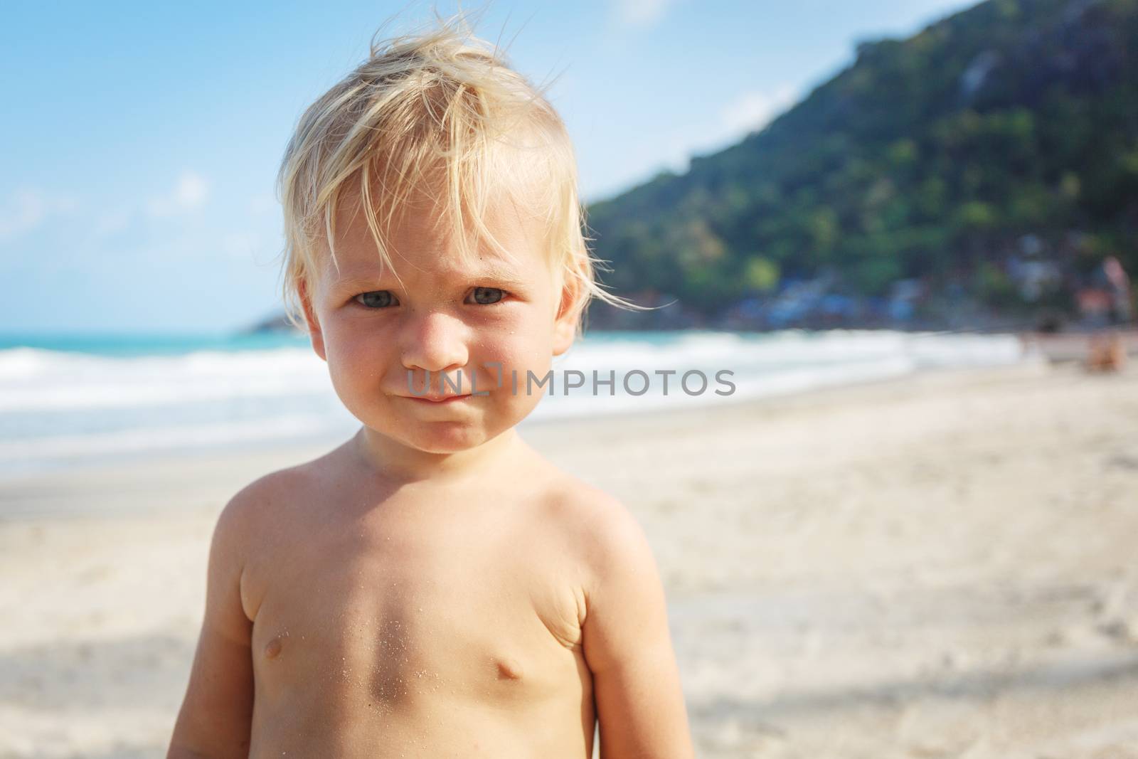 Portrait of little toddler on a beach by gorov108