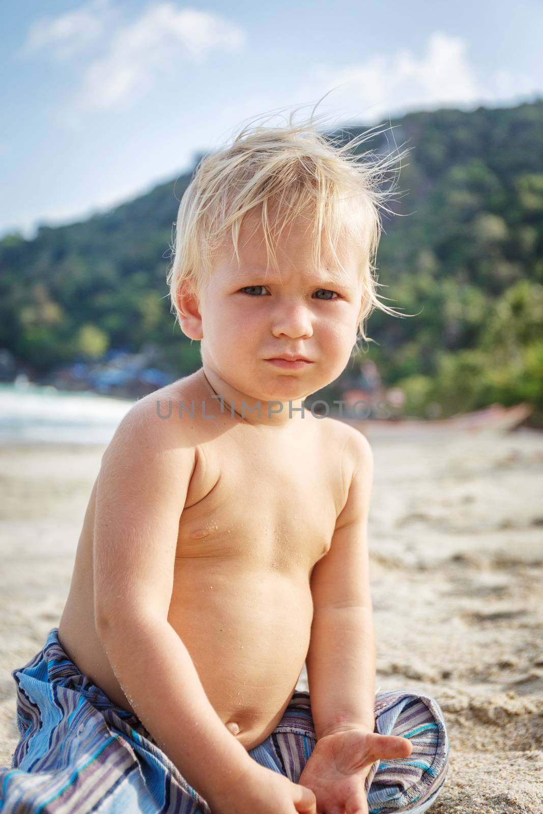 Portrait of little toddler on a beach by gorov108