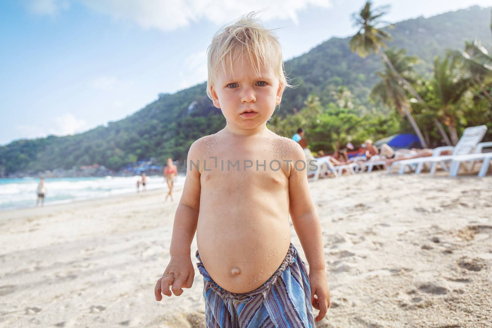Portrait of little toddler on a beach by gorov108