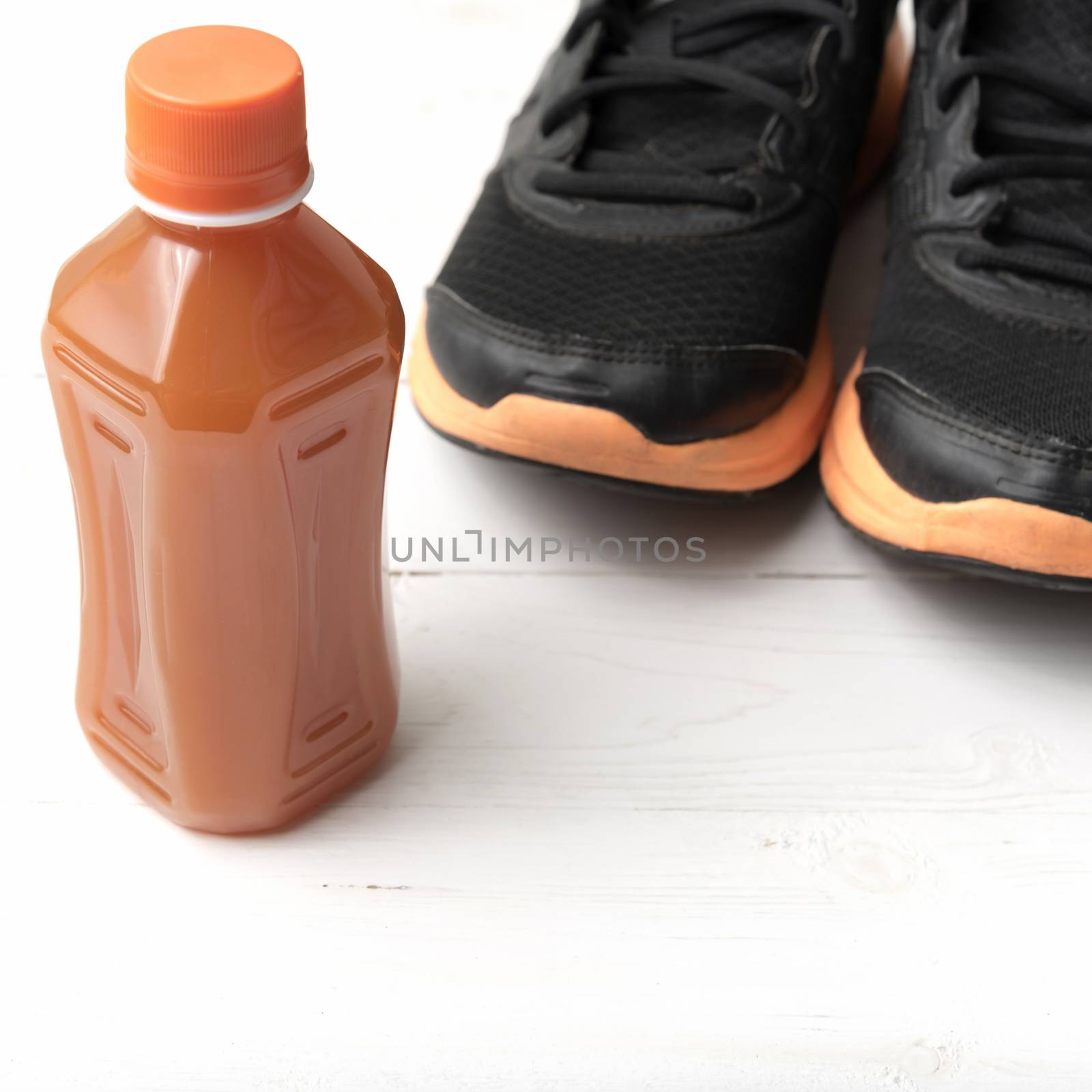 running shoes and orange juice by ammza12