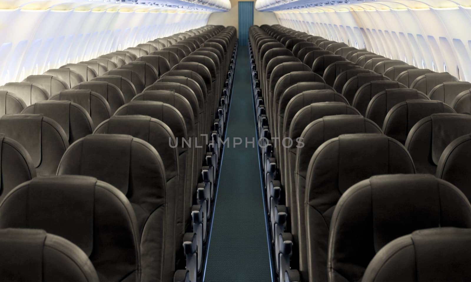 Airplane aisle with row of seats