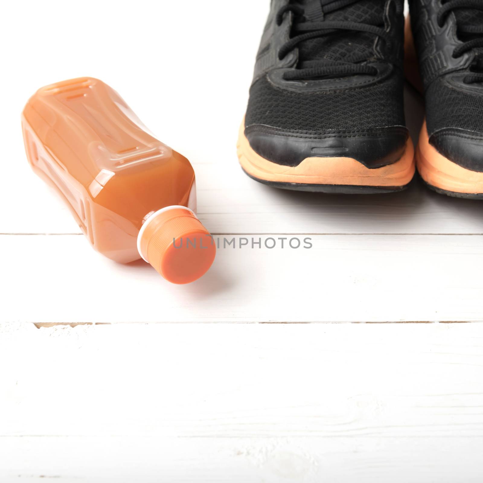 running shoes and orange juice by ammza12
