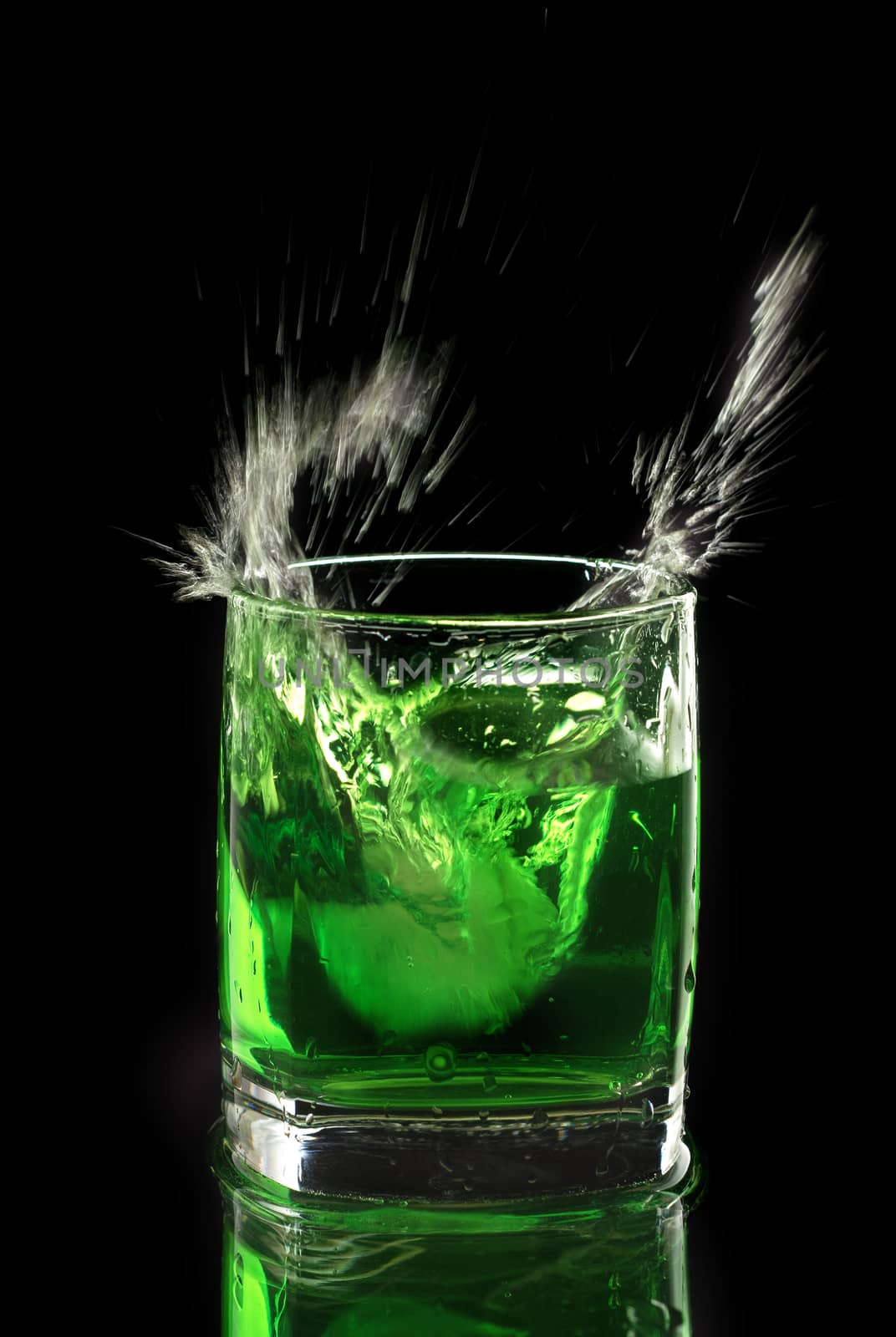 Green drink with ice and splashes. Russia