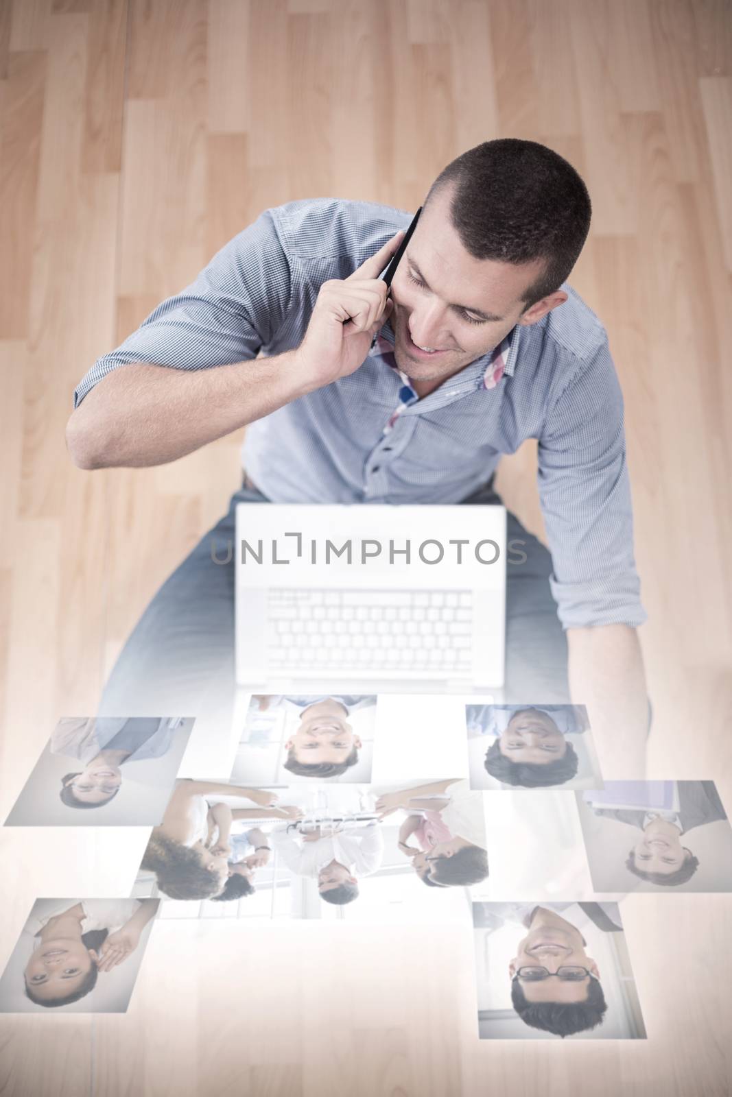 Business people having a meeting  against businessman talking on mobile phone