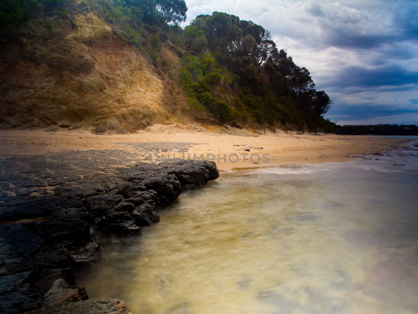 Ocean Rocks and Cliff with dramatic clouded sky