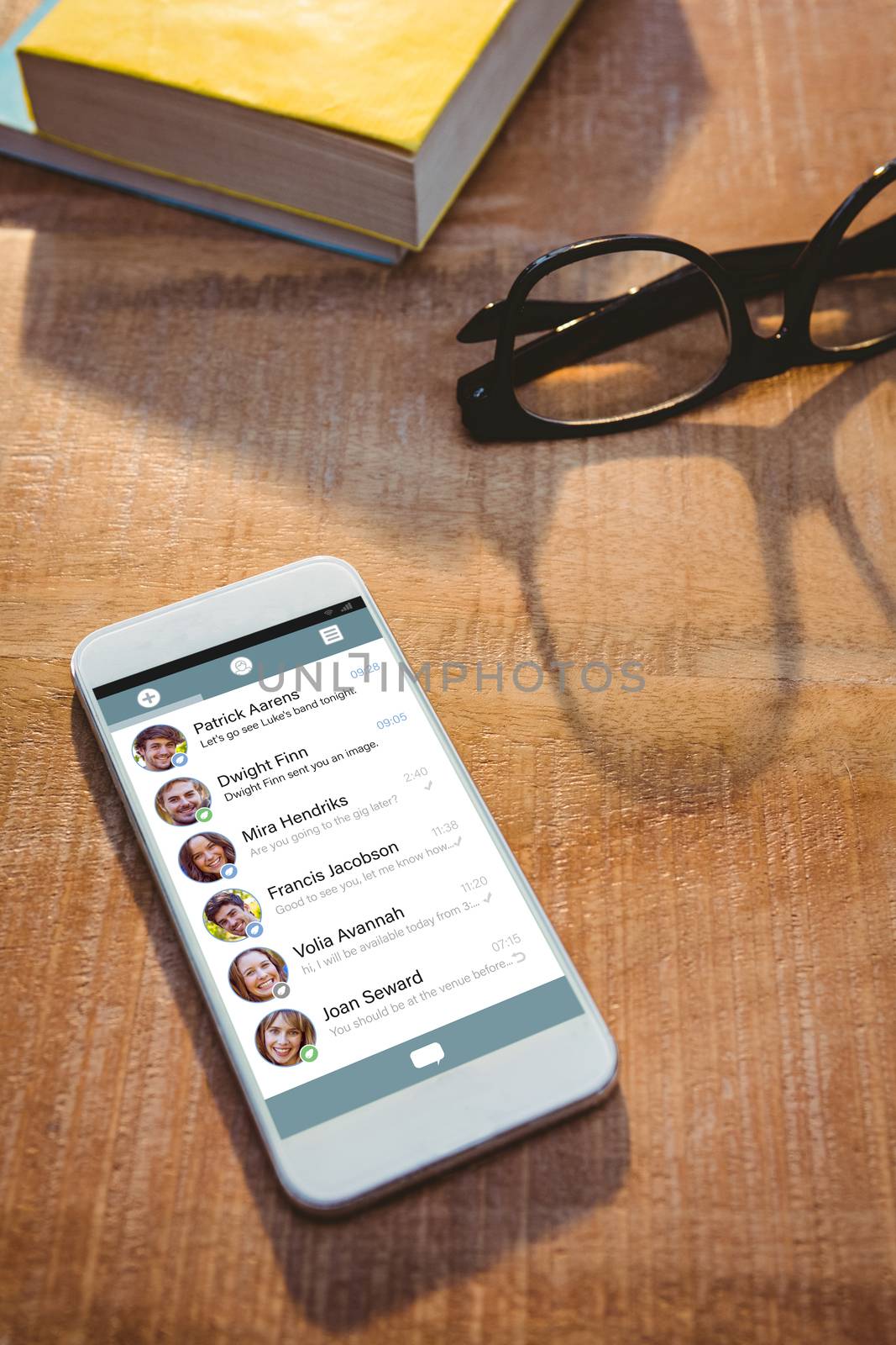 Smartphone app menu against close up view of smartphone and glasses