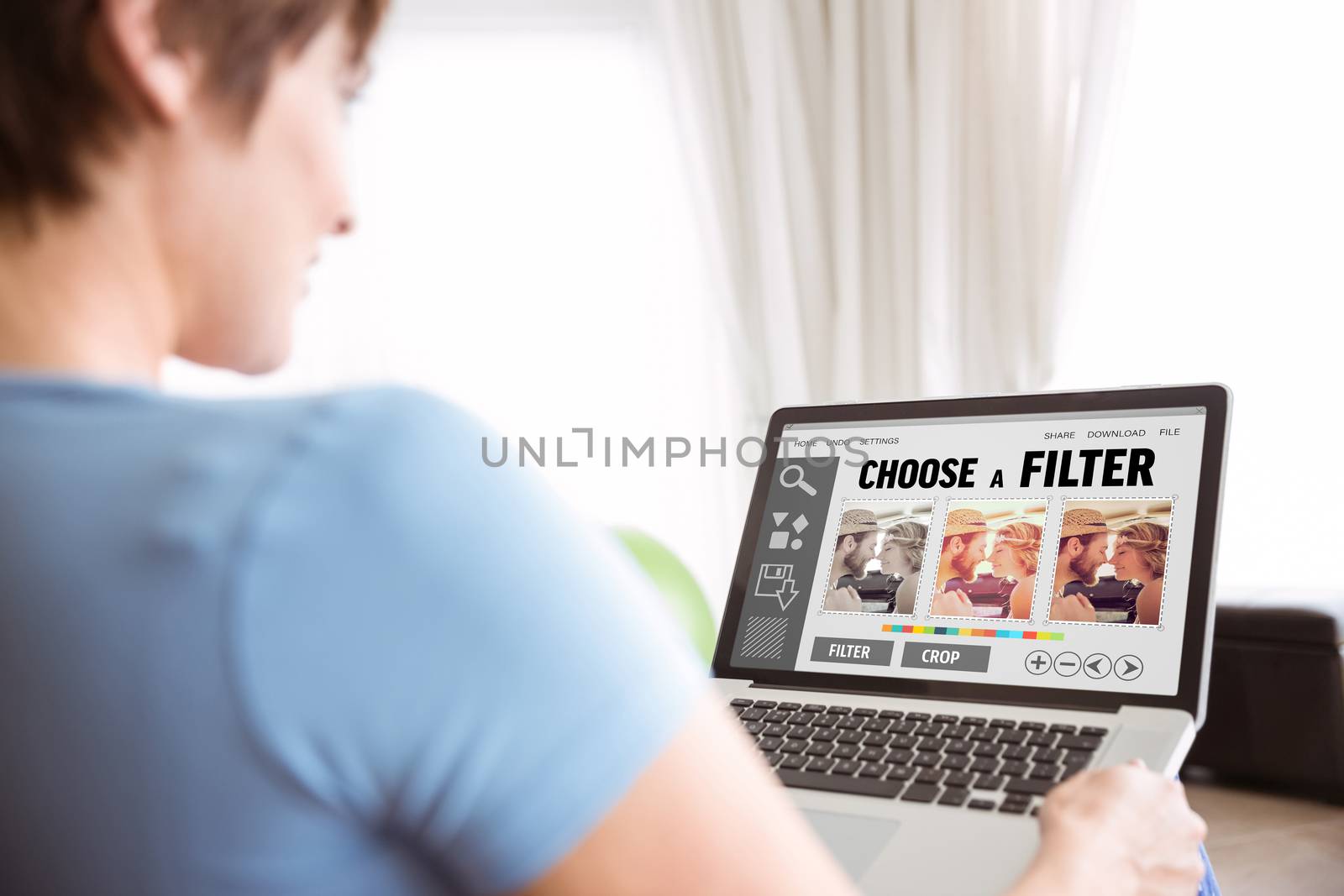 Composite image of pregnant woman using her laptop by Wavebreakmedia