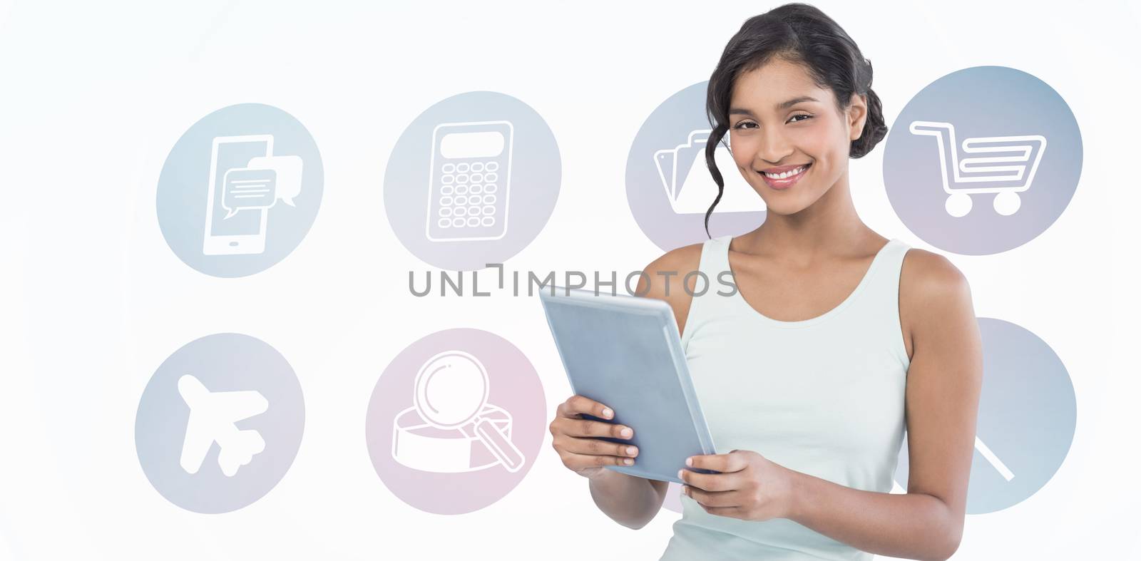 Portrait of smiling businesswoman using tablet computer against telephone apps icons 