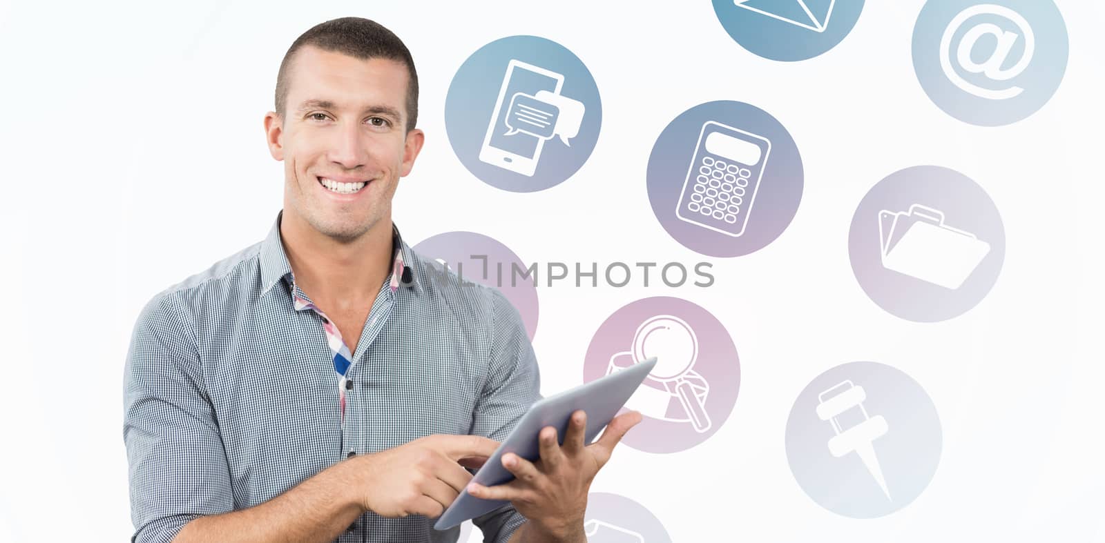 Smiling businessman using tablet computer over white background against telephone apps icons 