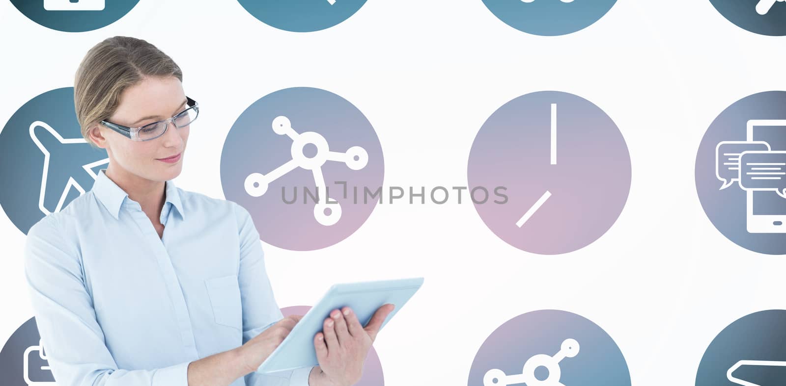 Composite image of businesswoman using tablet pc  by Wavebreakmedia