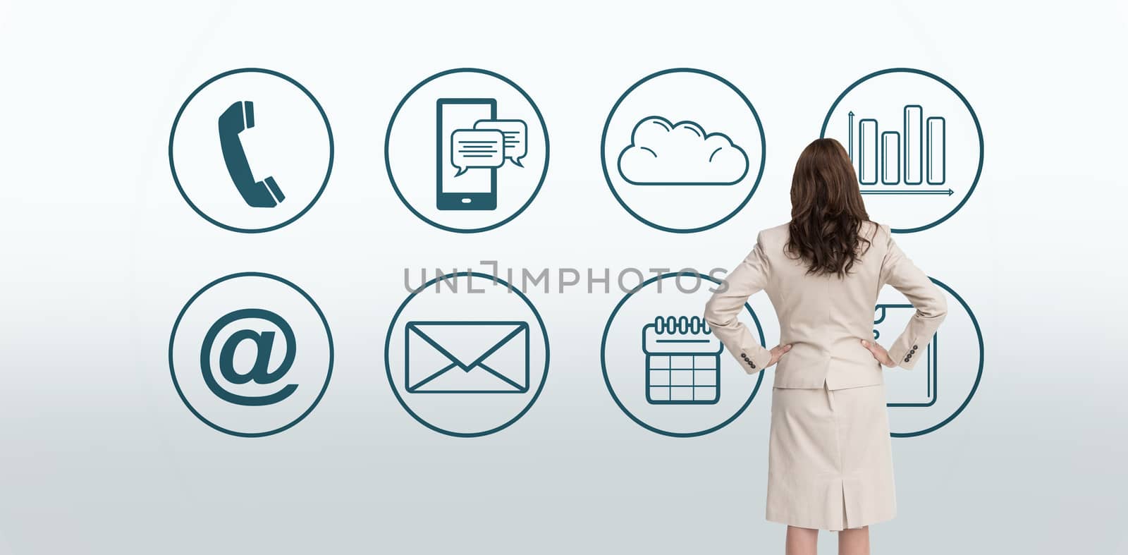 Composite image of businesswoman standing back to camera by Wavebreakmedia