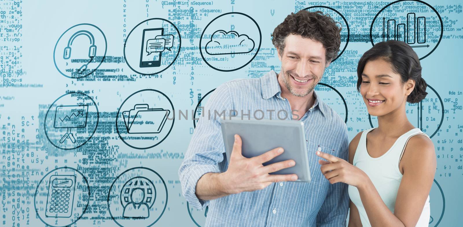 Composite image of smiling business people using digital tablet by Wavebreakmedia