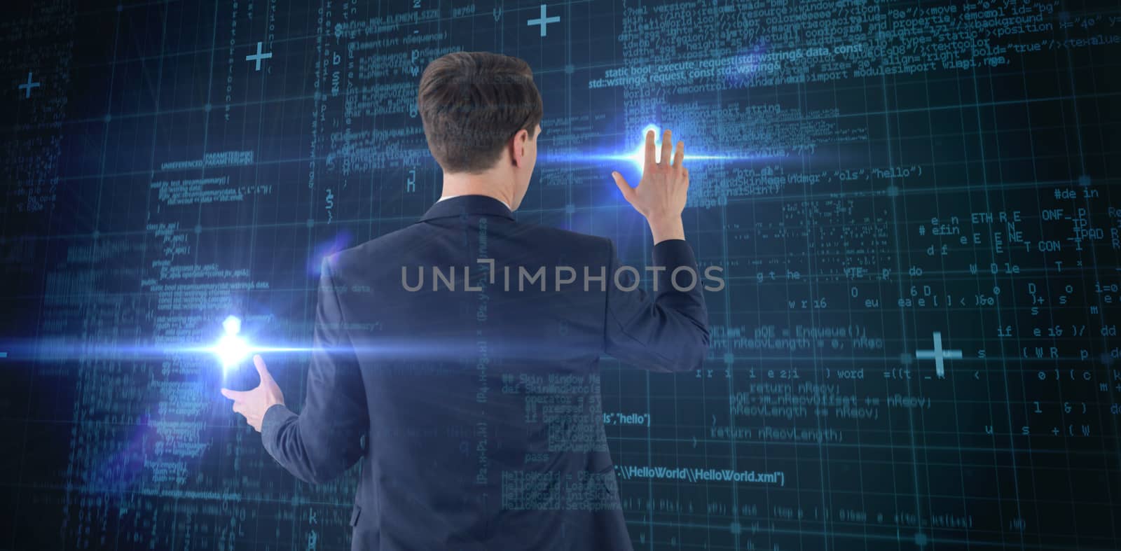 Wear view of businessman showing his hand  against blue matrix and codes