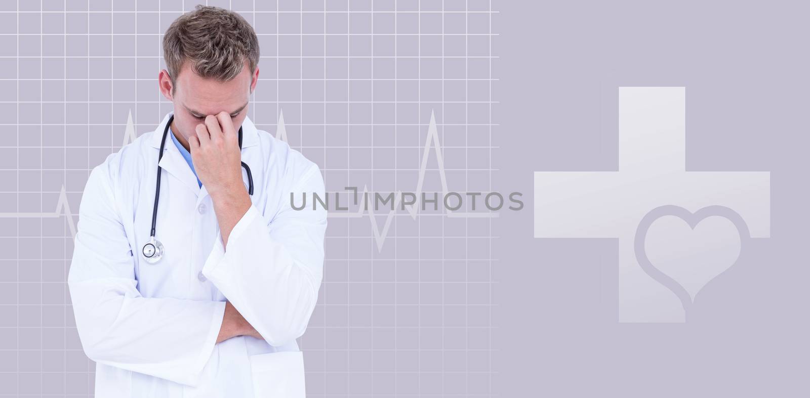 Male doctor suffering from headache against green background