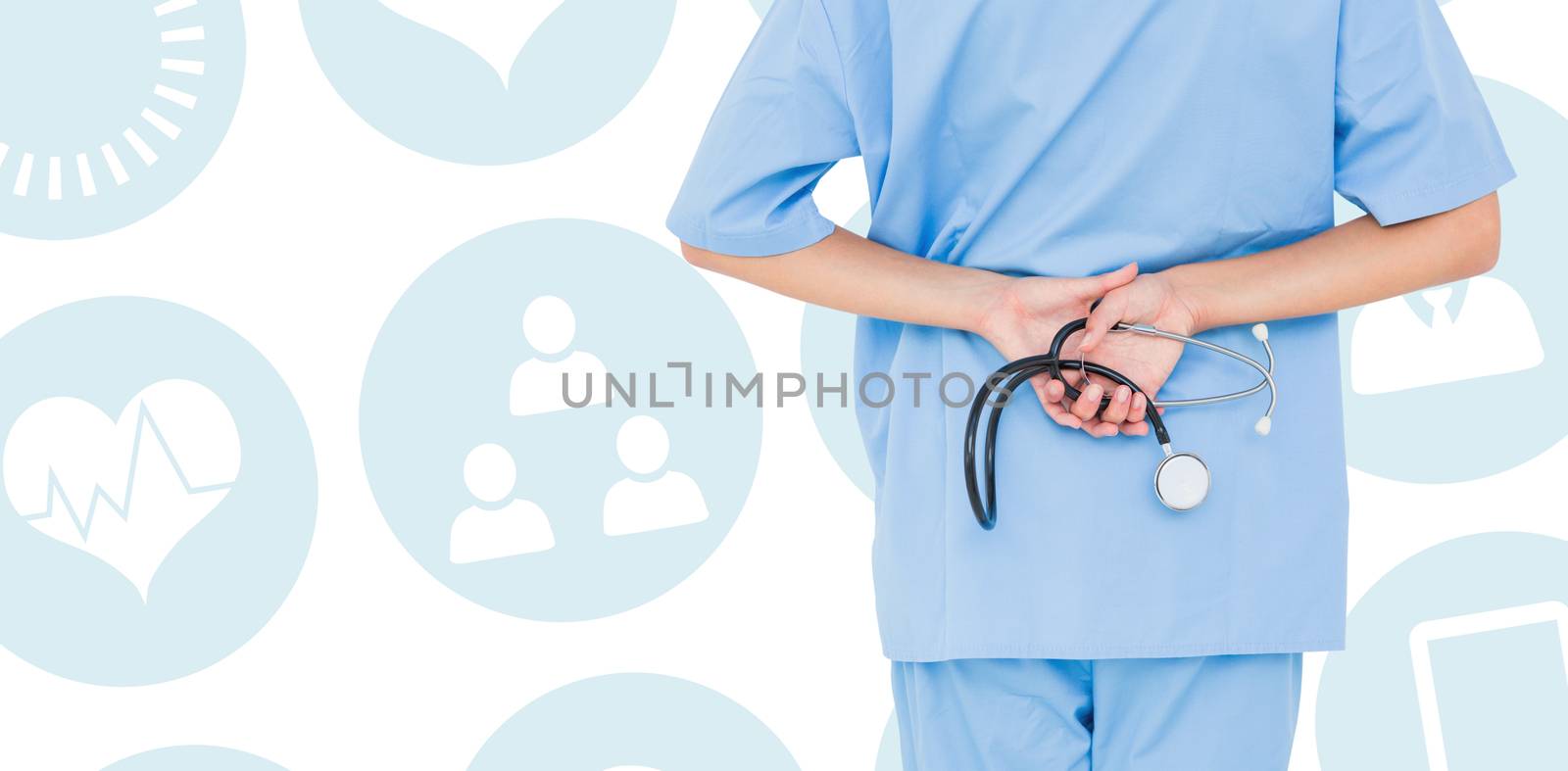 Rear view of female surgeon holding stethoscope against medical app