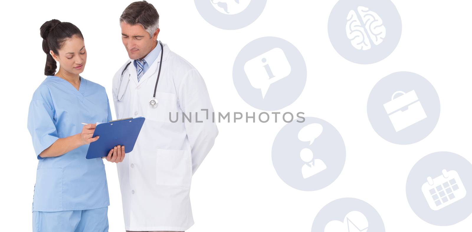 Doctor and nurse looking at clipboard against medical app