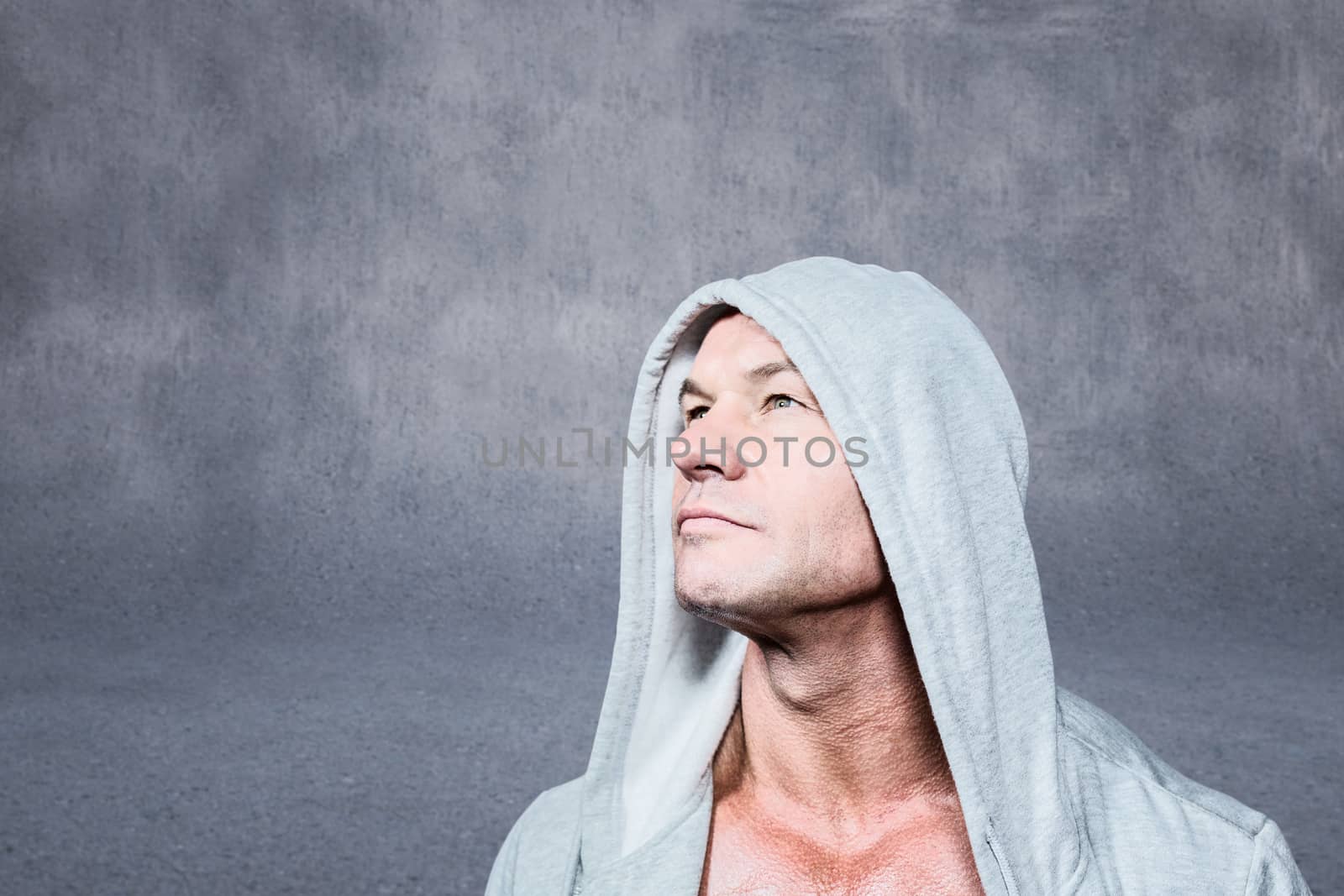 Composite image of thoughtful man looking up by Wavebreakmedia