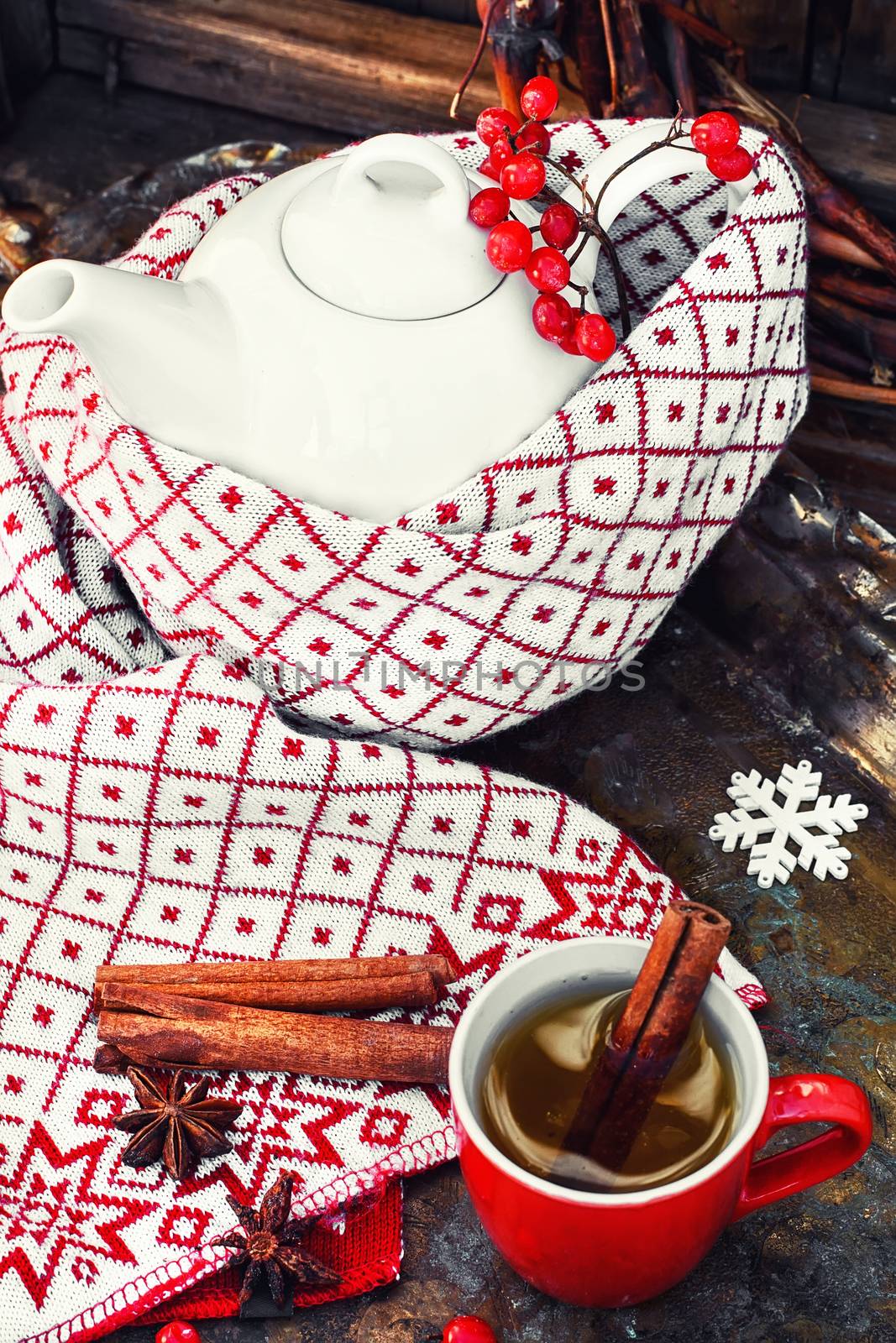 White custard glass teapot with warm scarf in country style