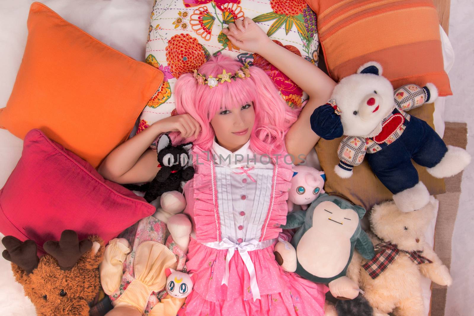 young girl in a bedroom in a pink cute dress by membio