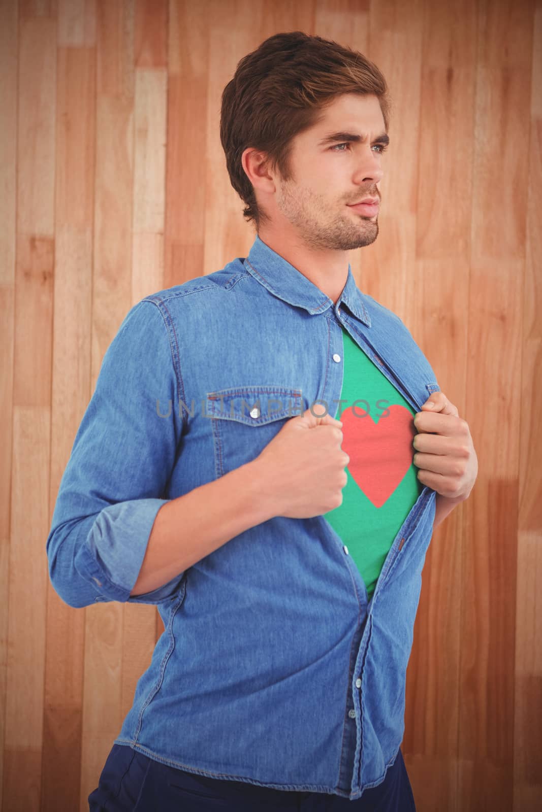 heart against confident hipster opening shirt in superhero style