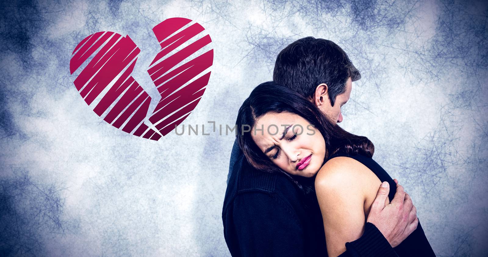 Sad couple embracing  against red heart