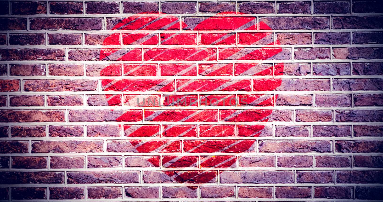 heart against red brick wall
