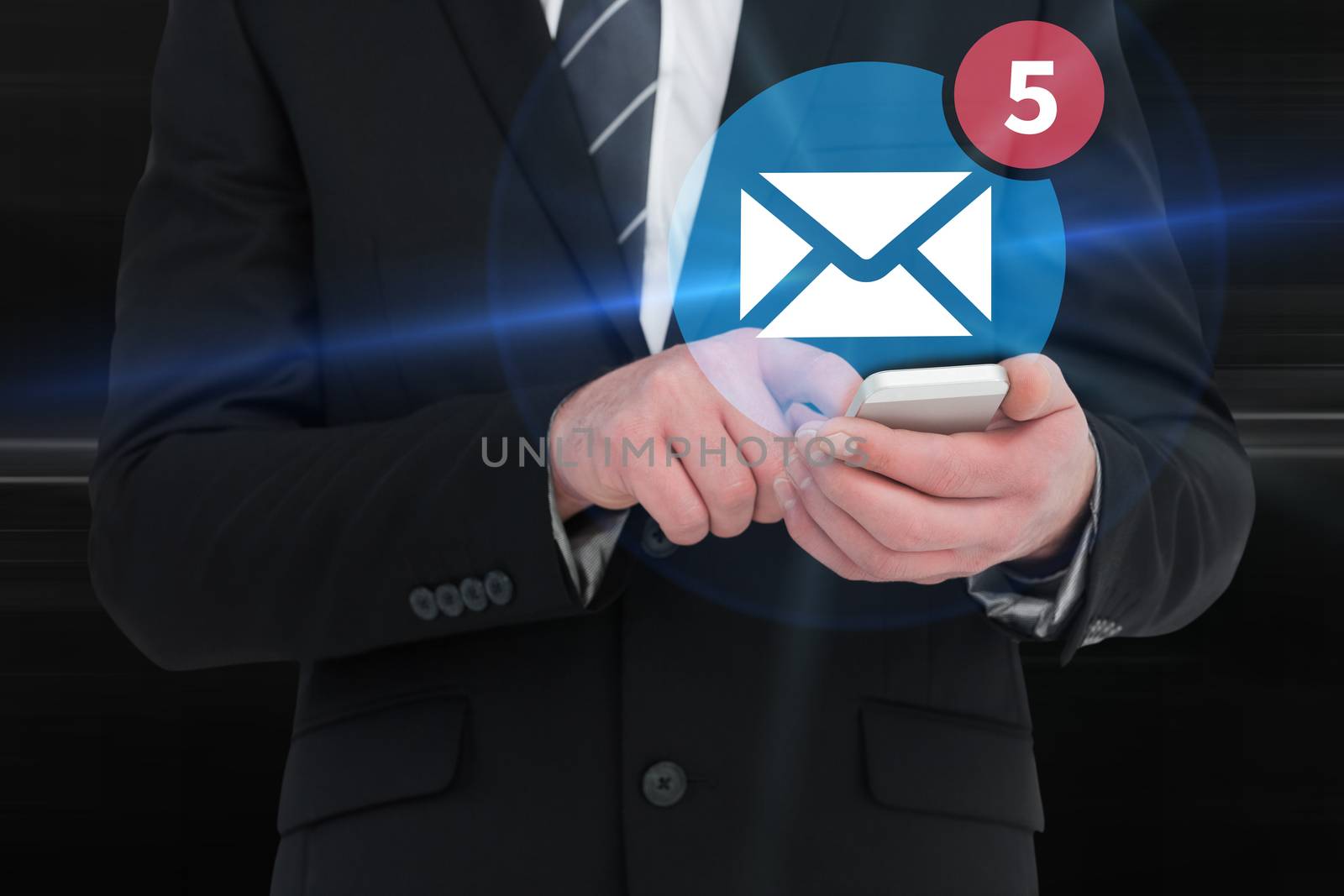 Businessman sending a text message against glowing abstract design