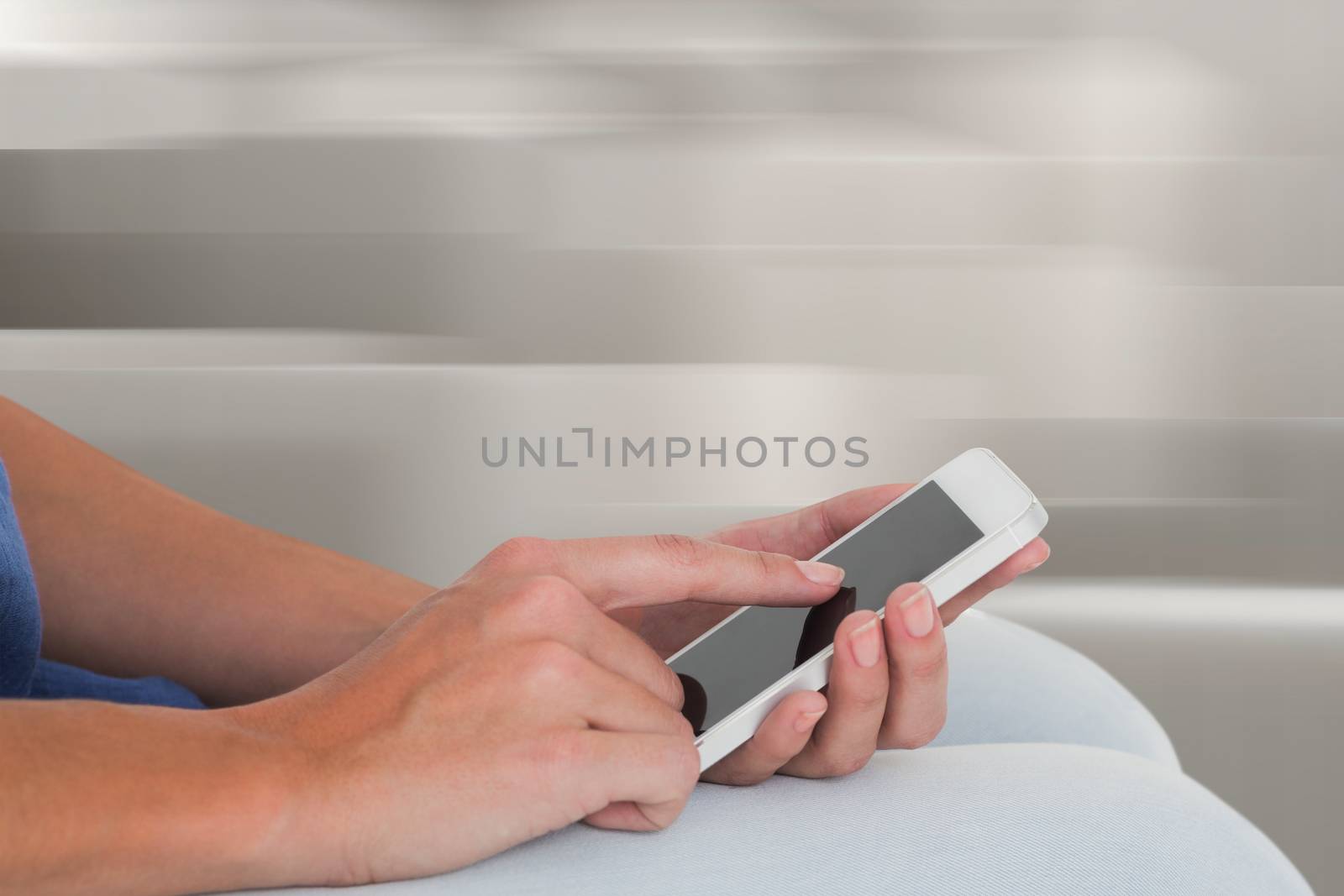Composite image of woman using mobile phone by Wavebreakmedia
