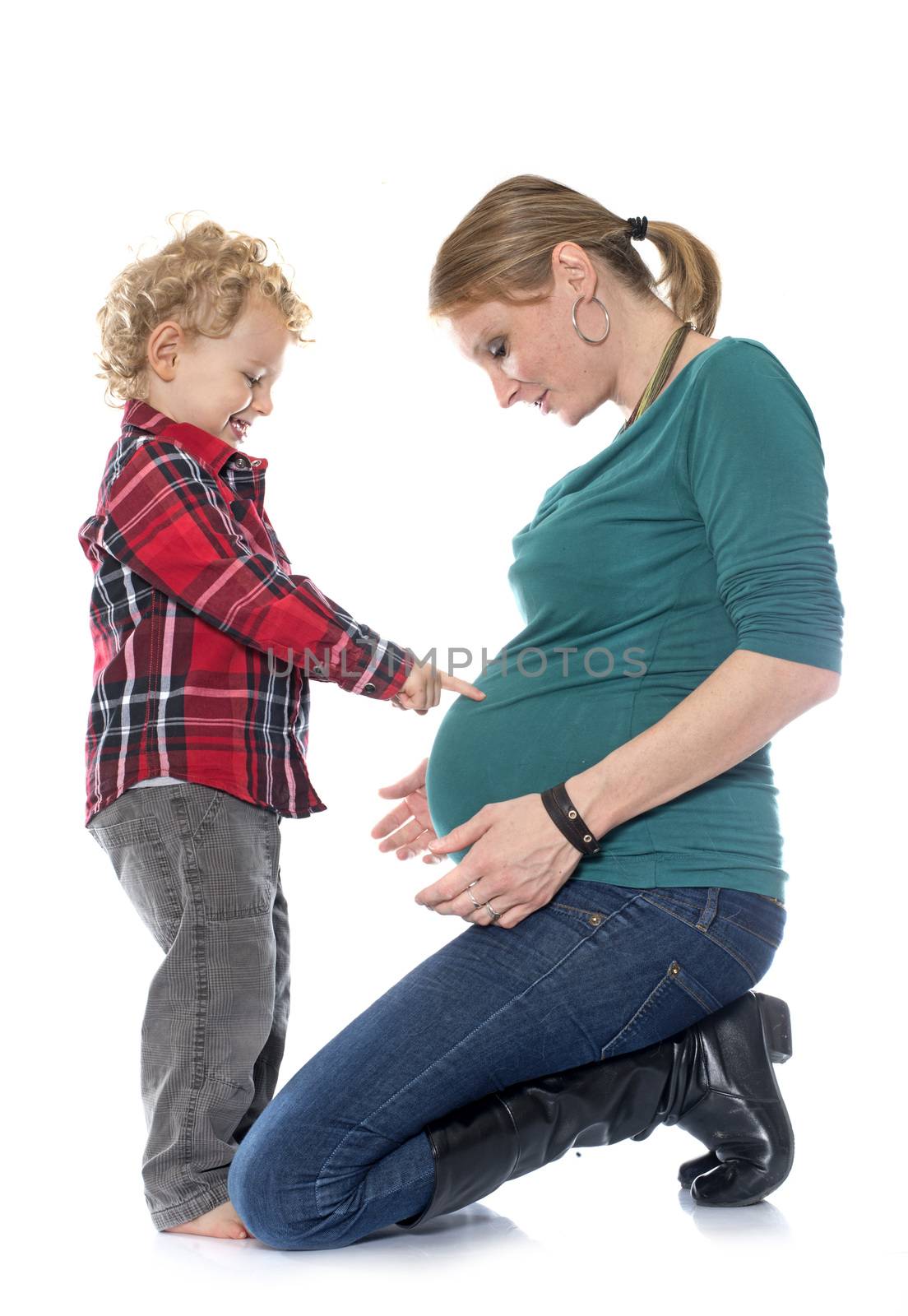 little boy and mother in front of white background