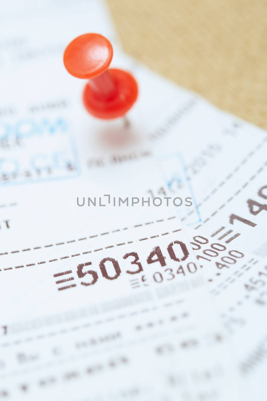 Cash register with pushpin. Close-up photo