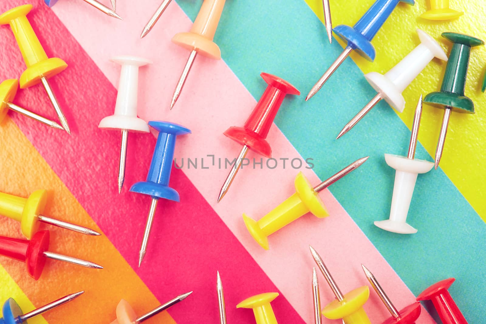 Close-up view on a multicolored set of pushpins