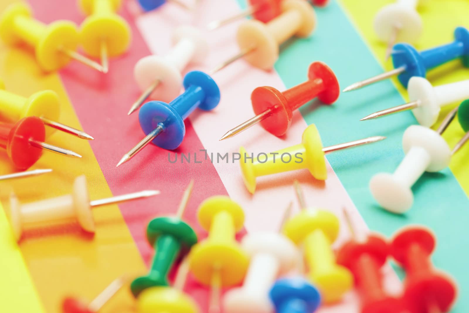 Close-up view on a multicolored set of pushpins