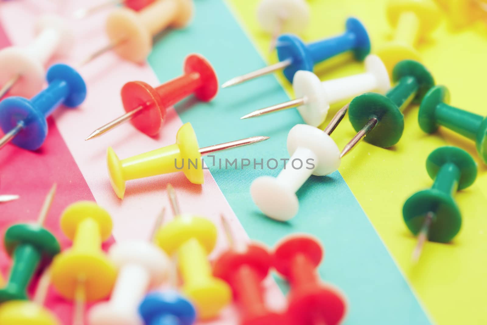 Close-up view on a multicolored set of pushpins